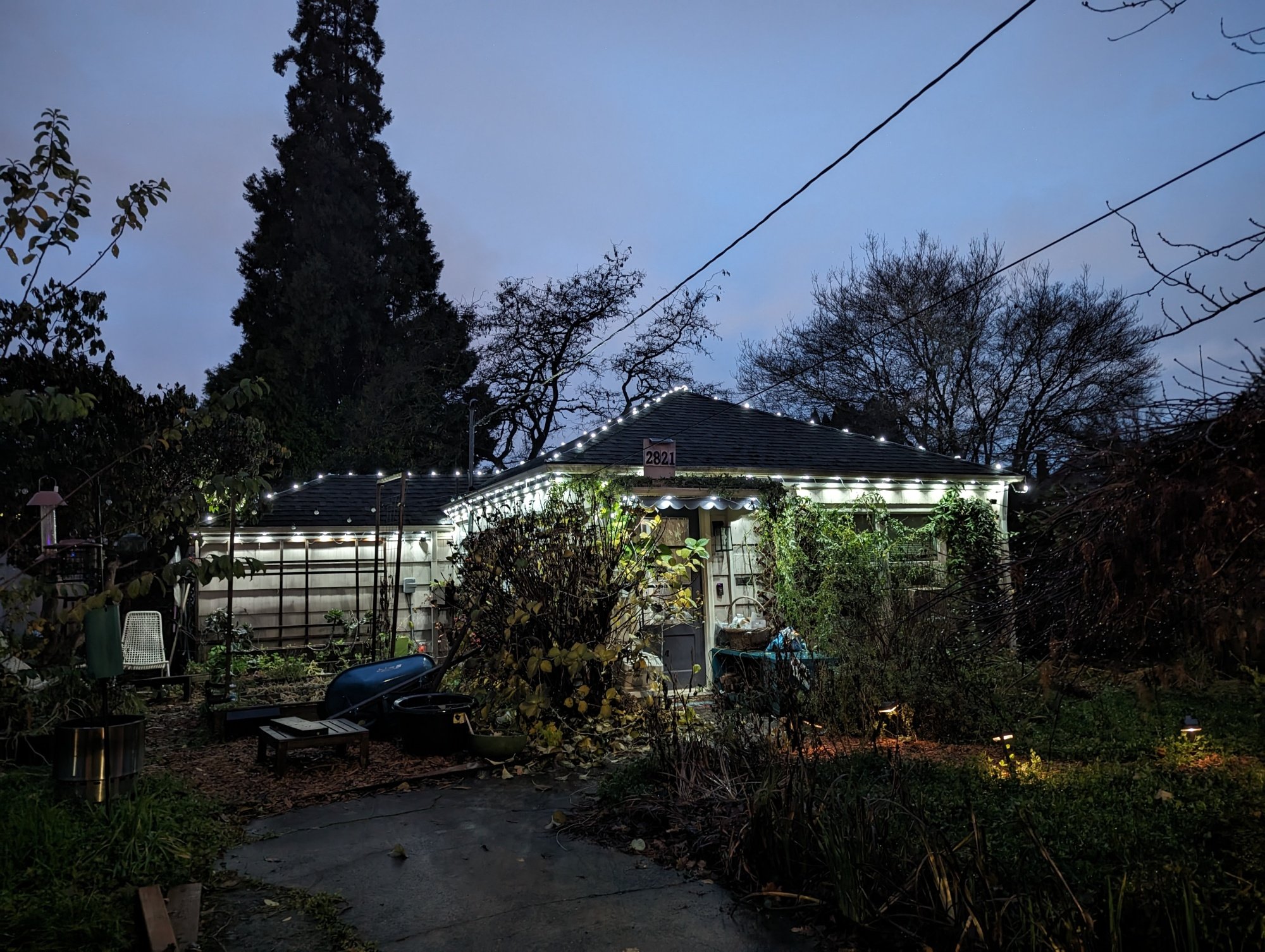 A house with white-colored holiday lights