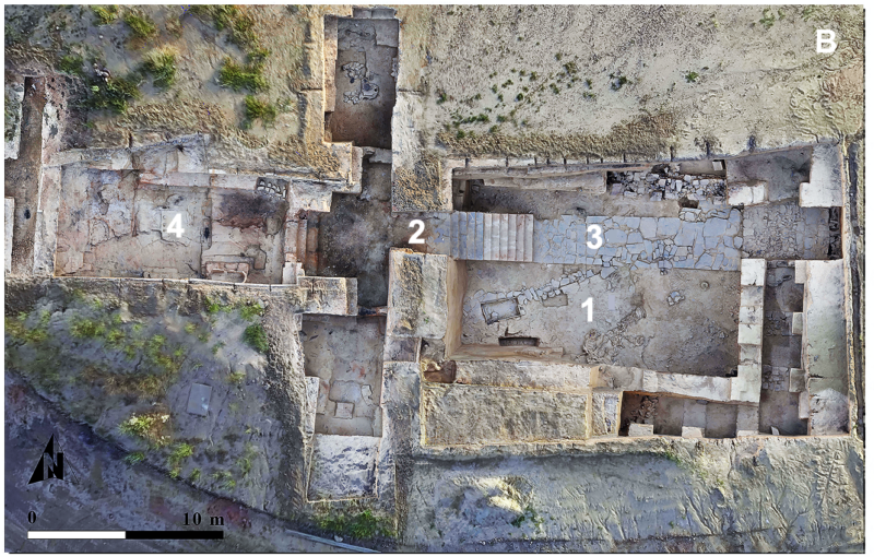 Image of a series of structures, including a square courtyard, steps, and walkways.