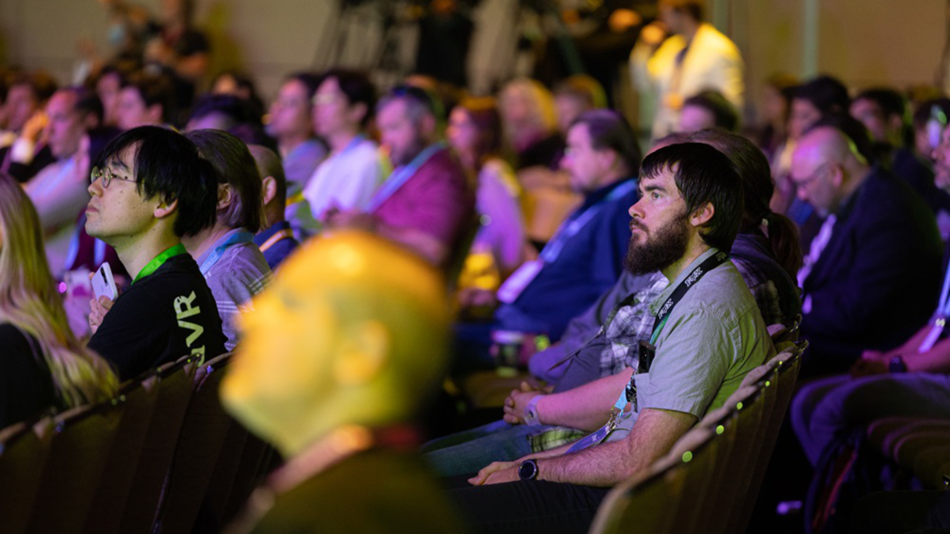 A look at the audience at the XR trade fair AWE shows men and women listening to a presentation.