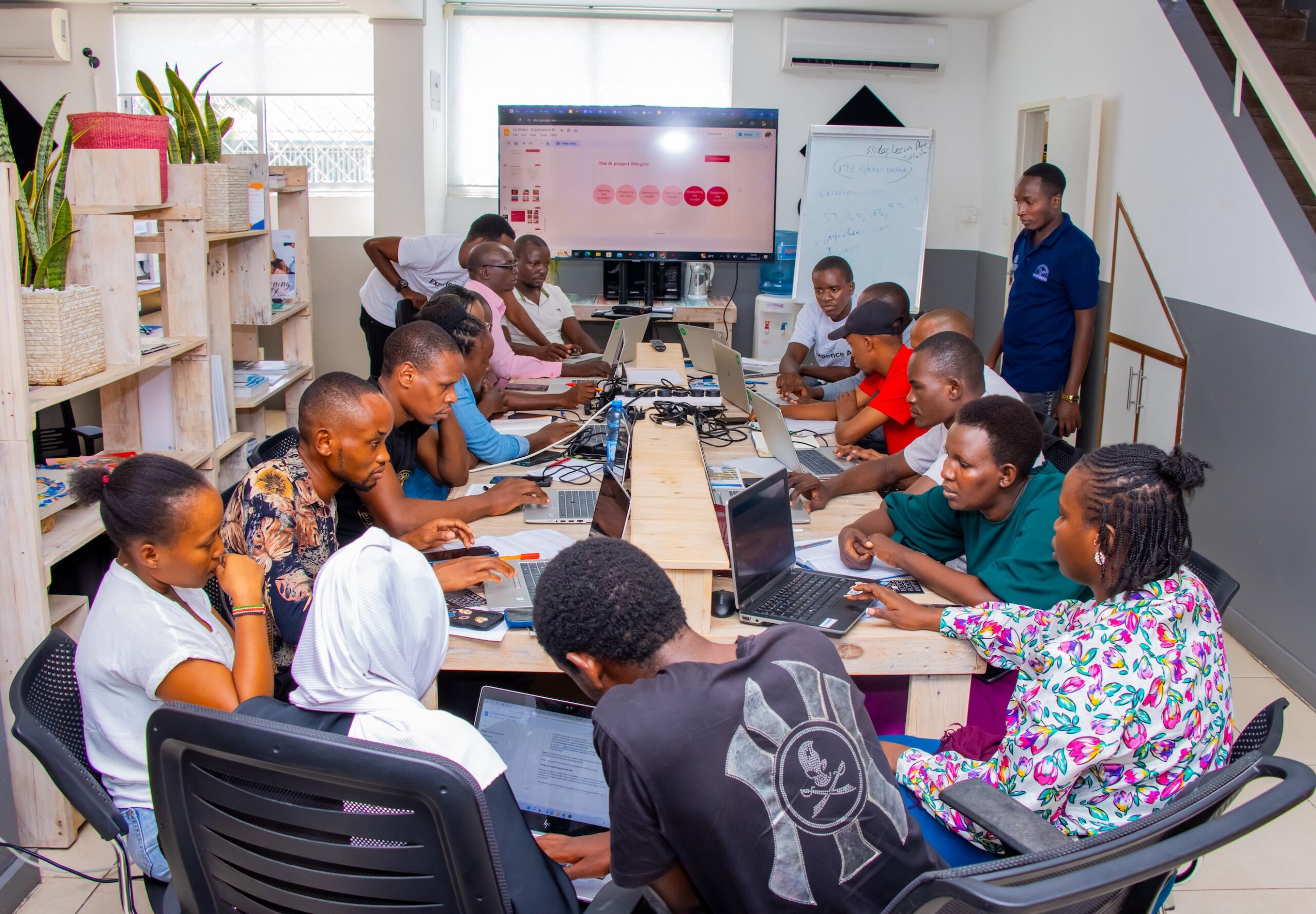 Photo of a group of educators participating in an Experience AI teacher training event in Kenya.