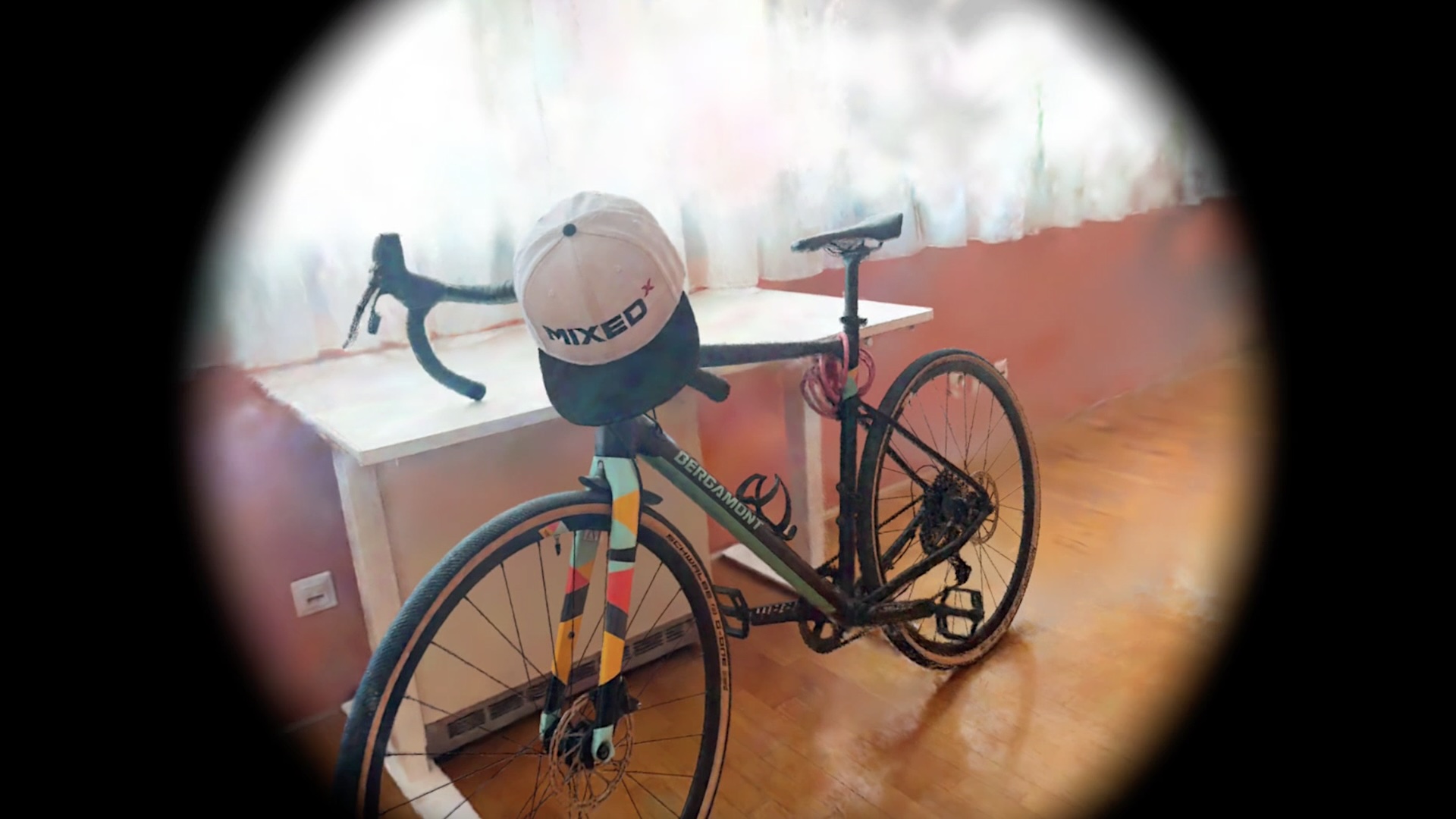 A bicycle leaning against a table.