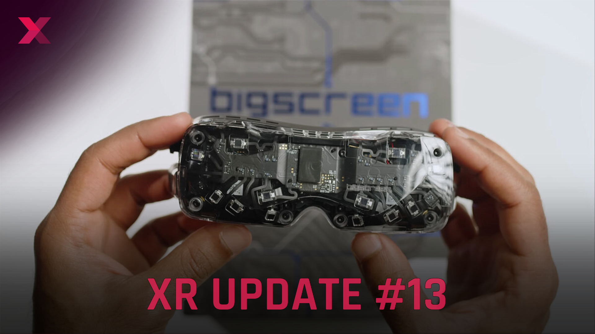 The Bigscreen Beyond 2 with transparent cover, held by two hands. The lettering "XR Update #13" can be seen in the foreground