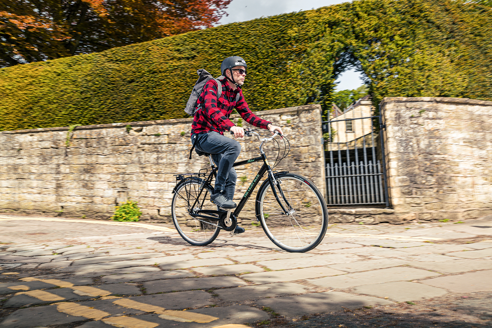 Male cyclist riding the The Light Blue Parkside commuter road bike