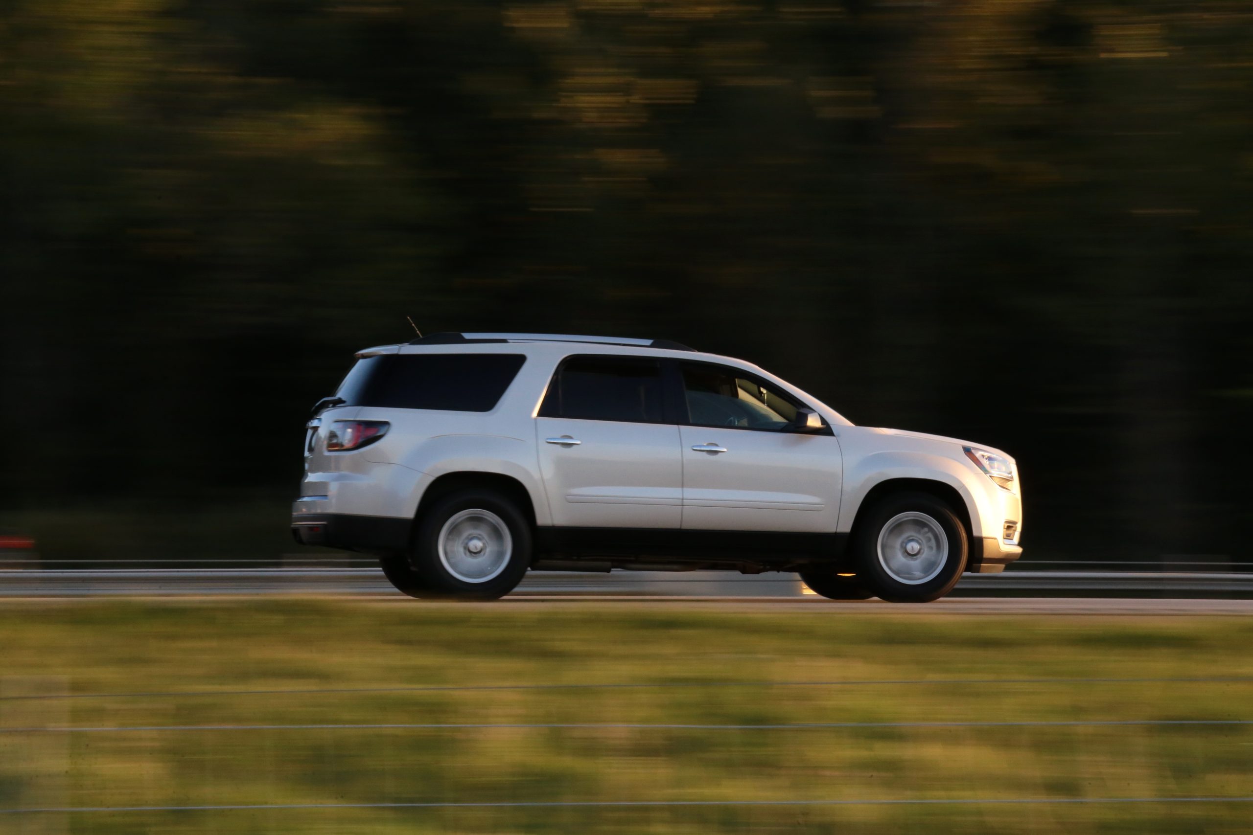 Moving SUV on a rural highway