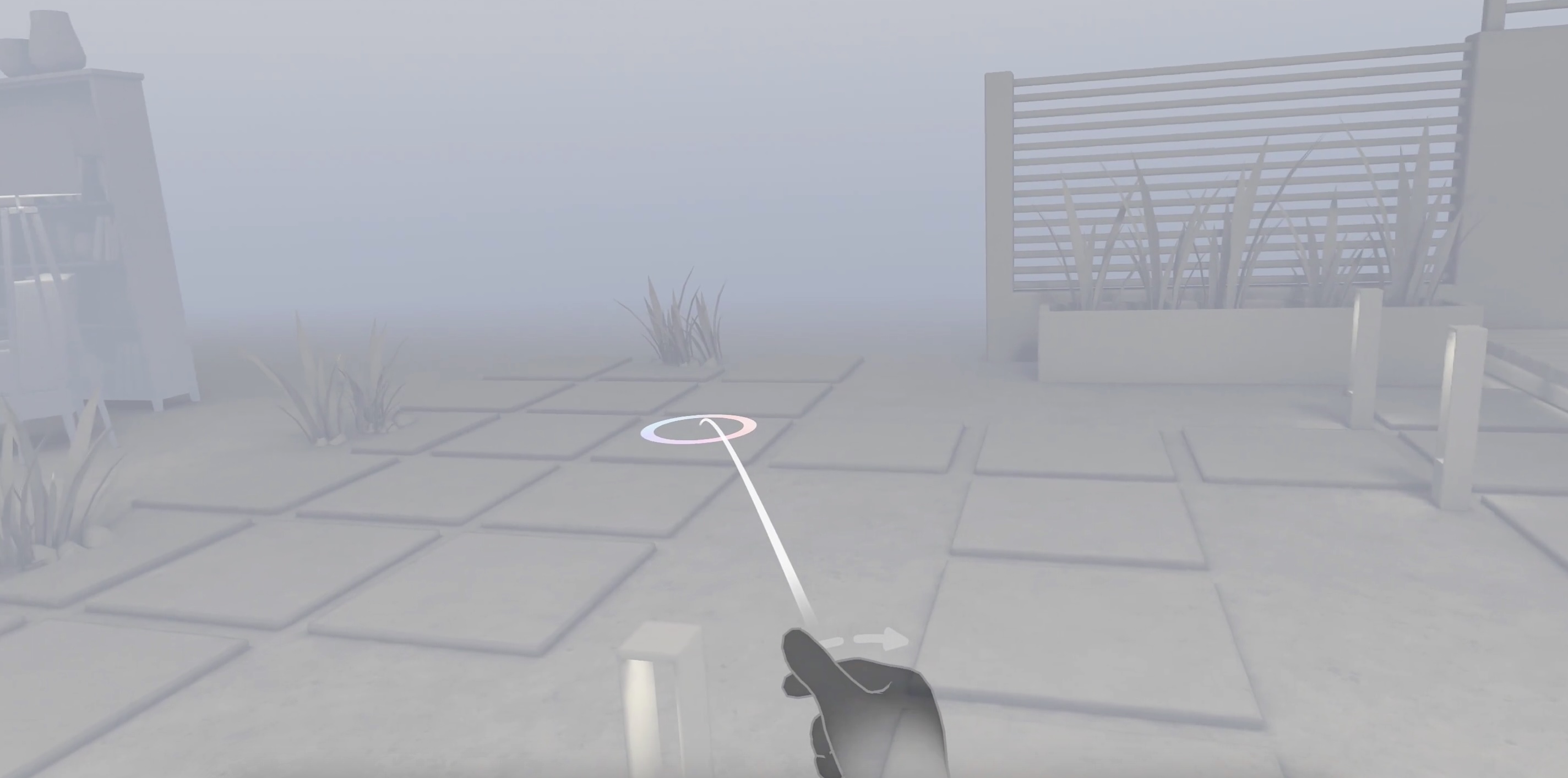 Hand with VR controller navigates a colored cursor over grey floor tiles in a foggy, grey garden.