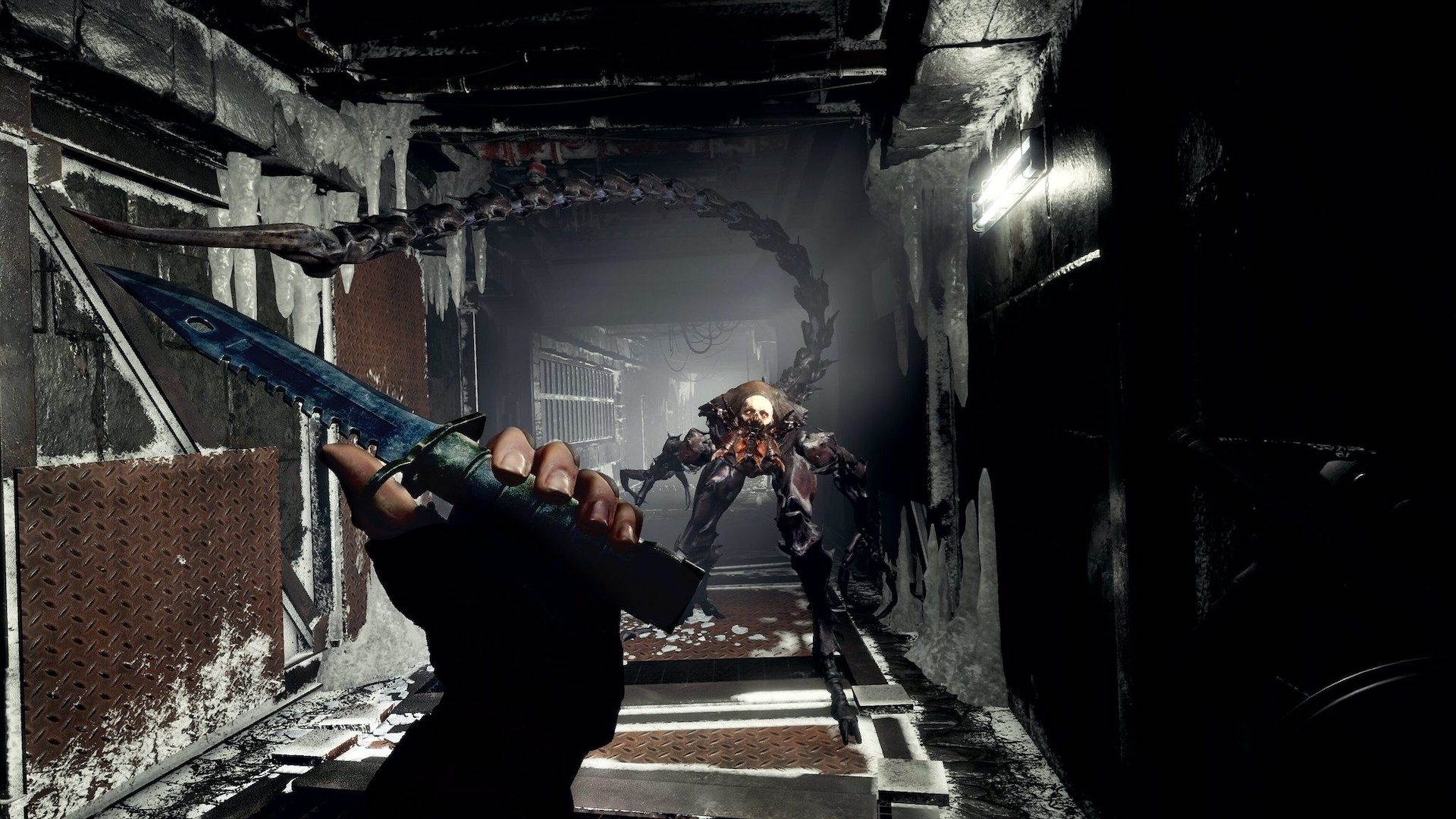 A monster attacks while the player draws the knife.