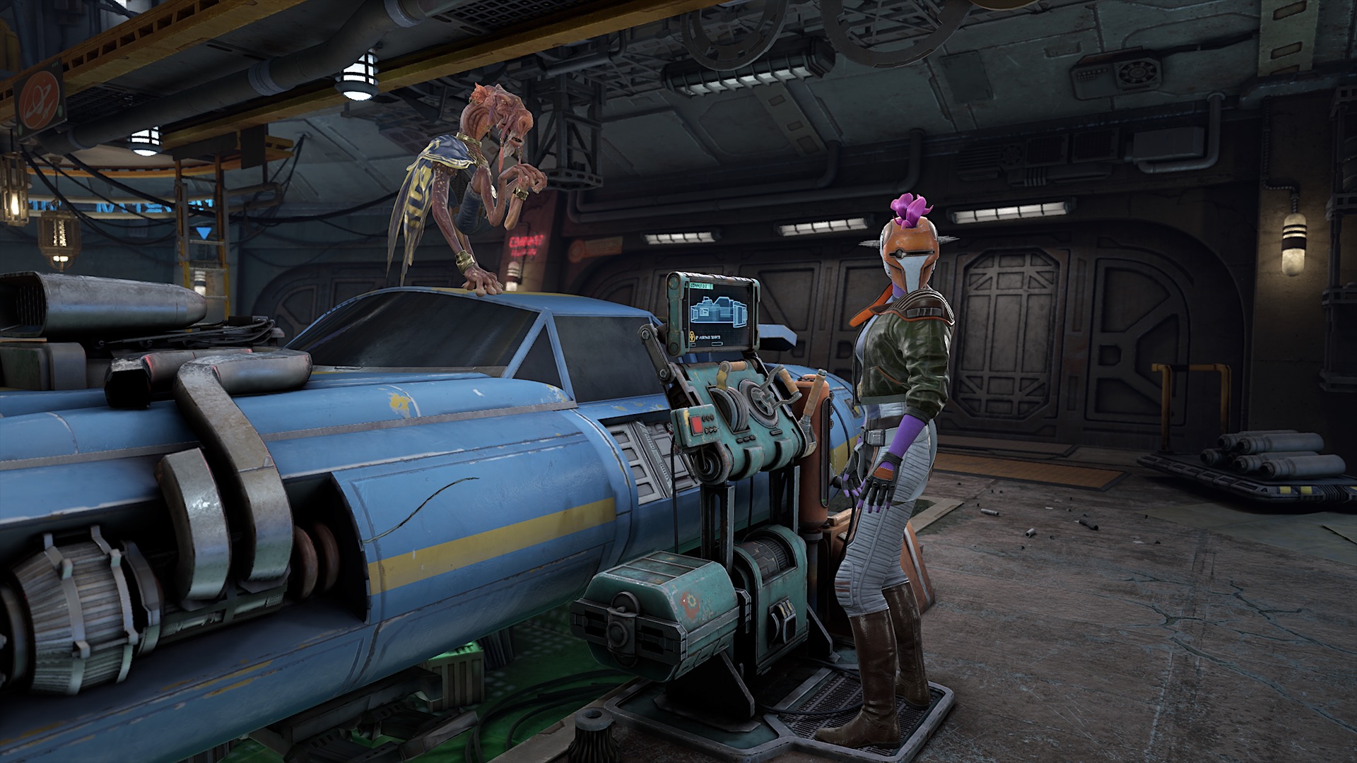 A person in a helmet and leather jacket stands next to a blue spaceship and a repair station in a workshop. An alien observes the scene.