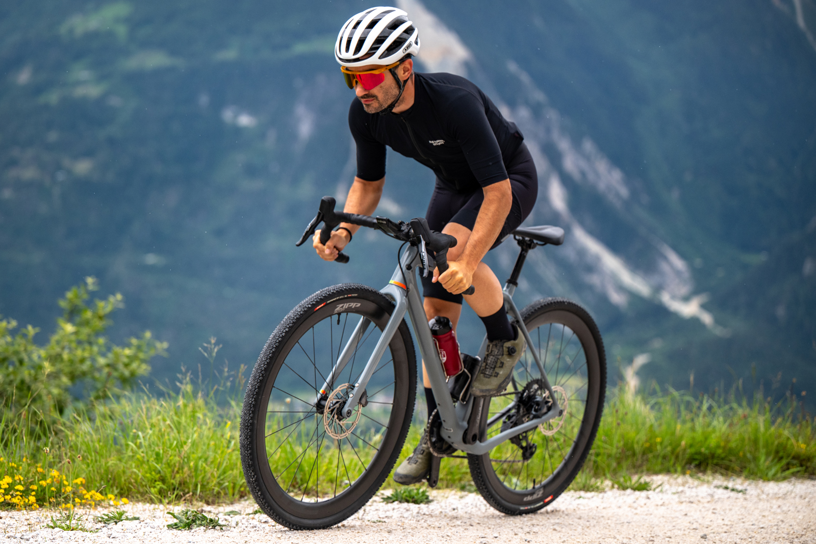 Man riding gravel bike with Vittoria T50 tyres.
