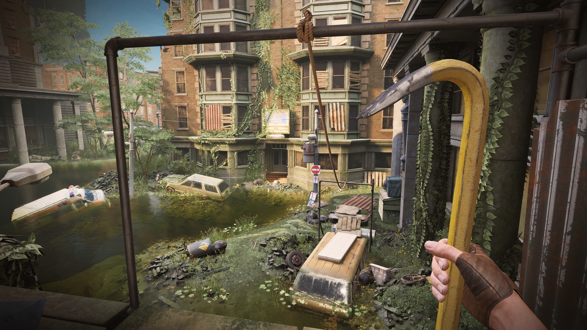 The player stands in front of an overgrown cityscape with a crowbar in his hand.