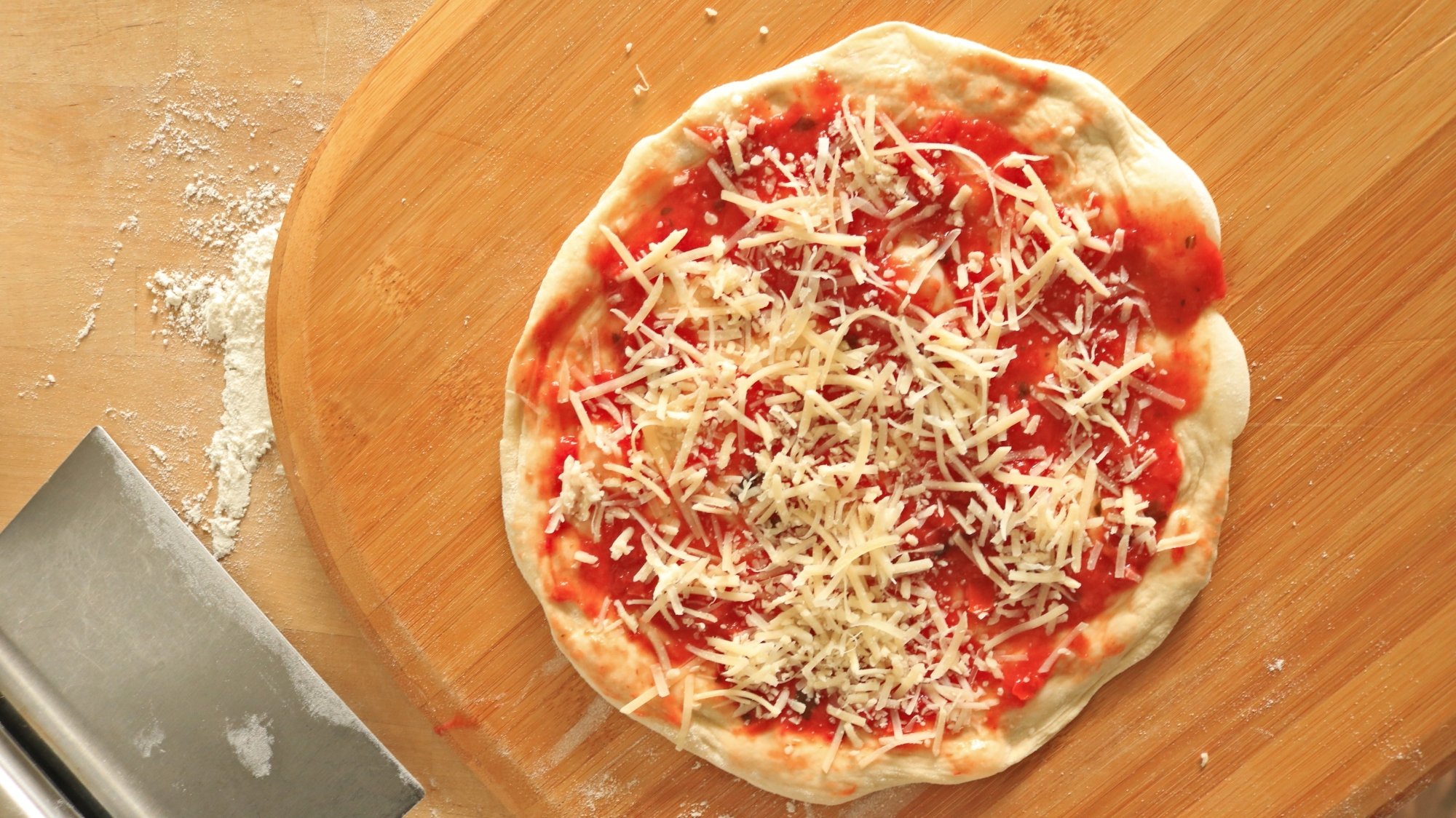 Parmesan cheese on a pizza.