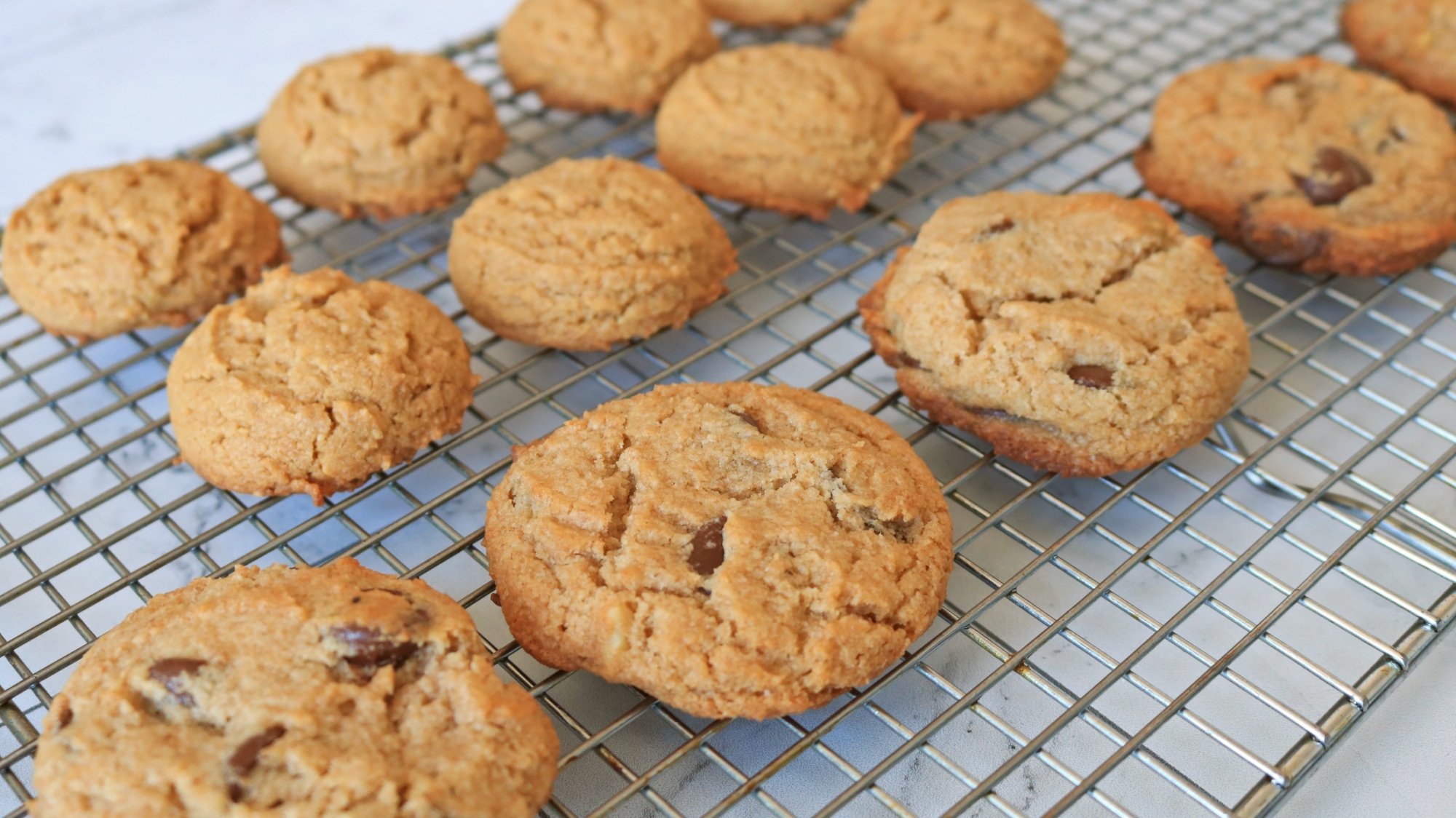 Cookies on a wire cooling rack.