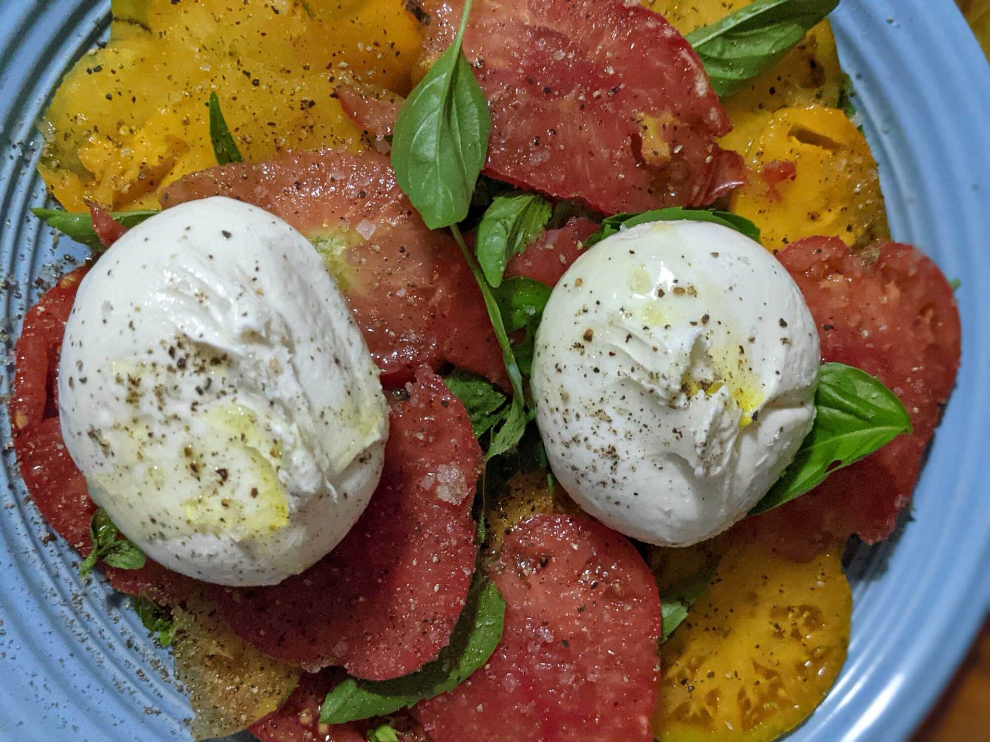 A caprese of slicer tomatoes