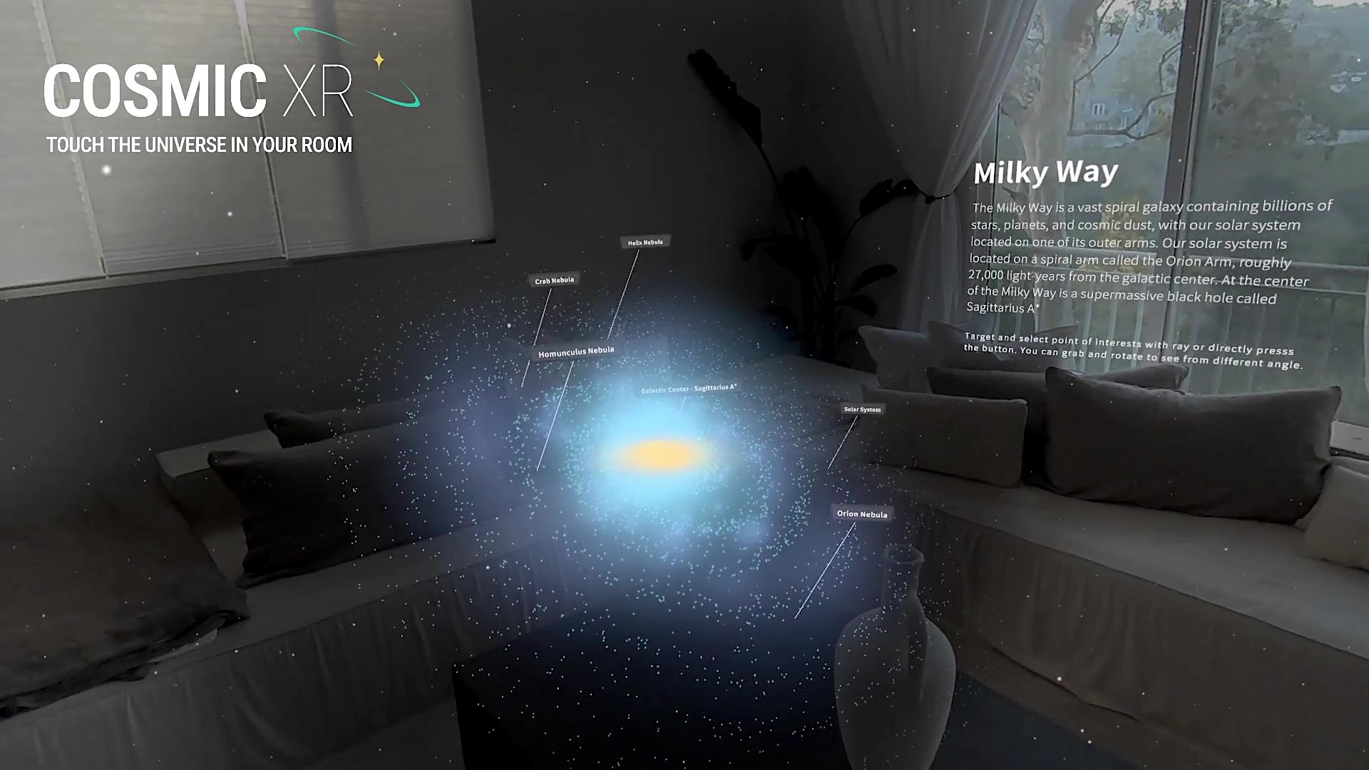 Mixed reality visualization of the Milky Way with labeled nebulae and galactic center in a living room.