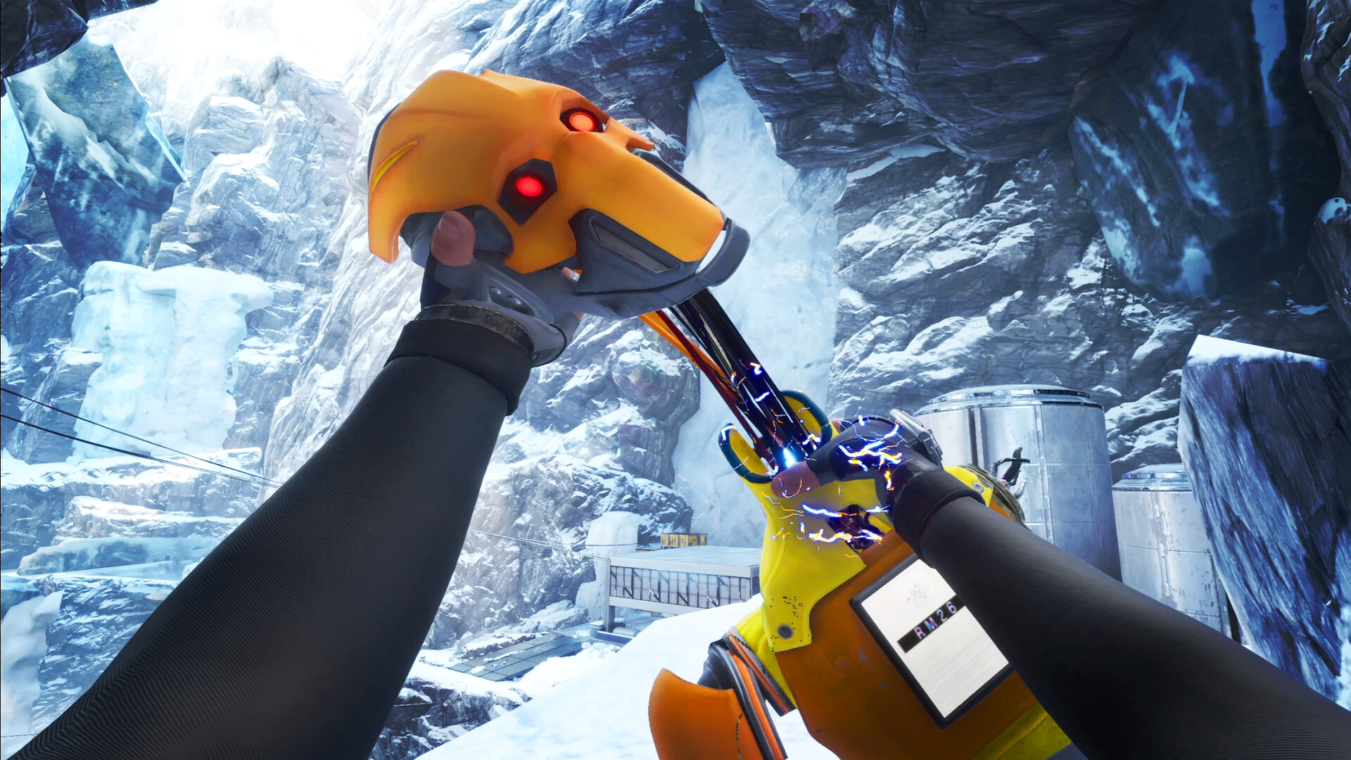 First-person perspective on a futuristic yellow-orange android with red lights in a snow-covered mountain gorge, whose head is torn off.