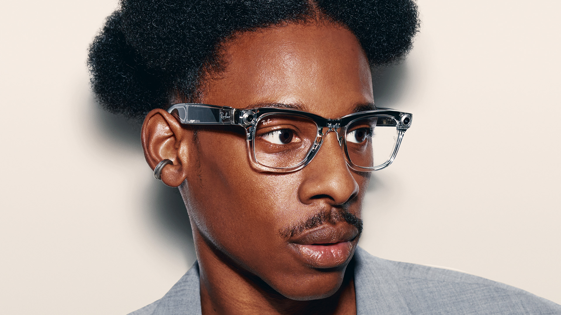 Man with Ray-Ban Meta Smart Glasses.