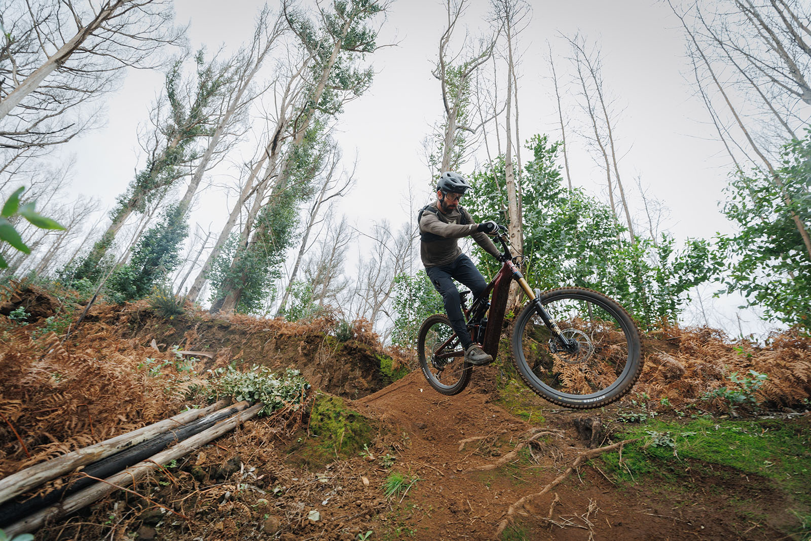 Male rider in grey top testing the Specialized S-Works Turbo Levo 4 full suspension mountaim eBike