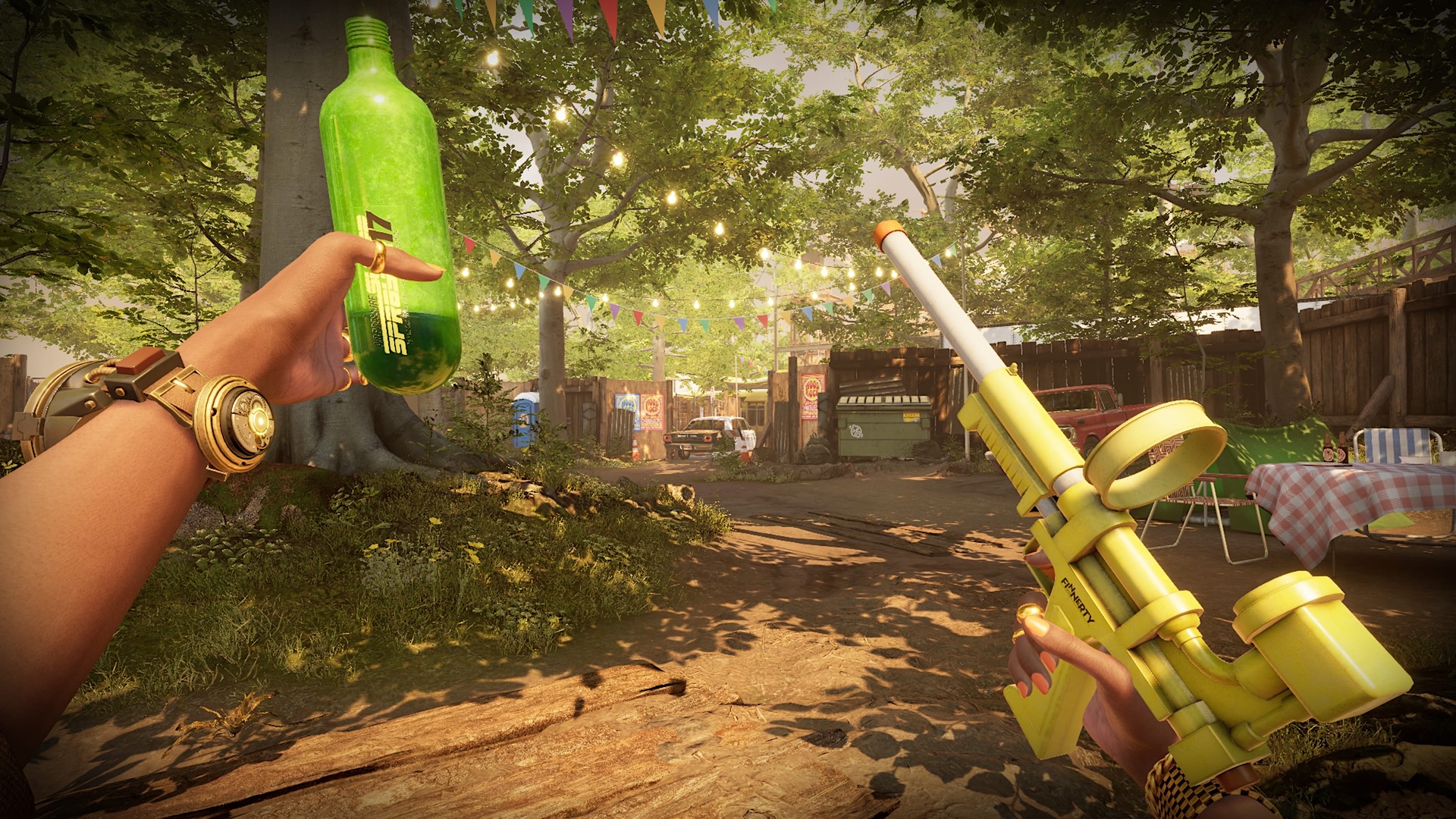 First-person view of a person with a green water spray gun in a garden with trees and festive decorations.