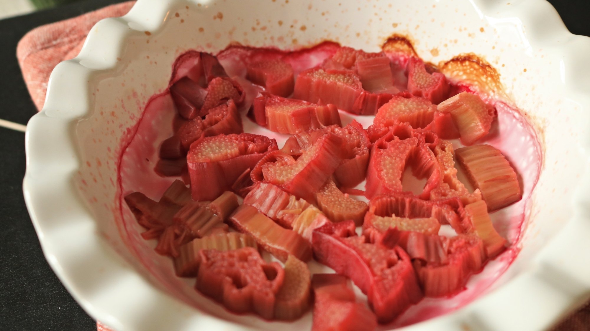 Rhubarb cooked in a pie dish.