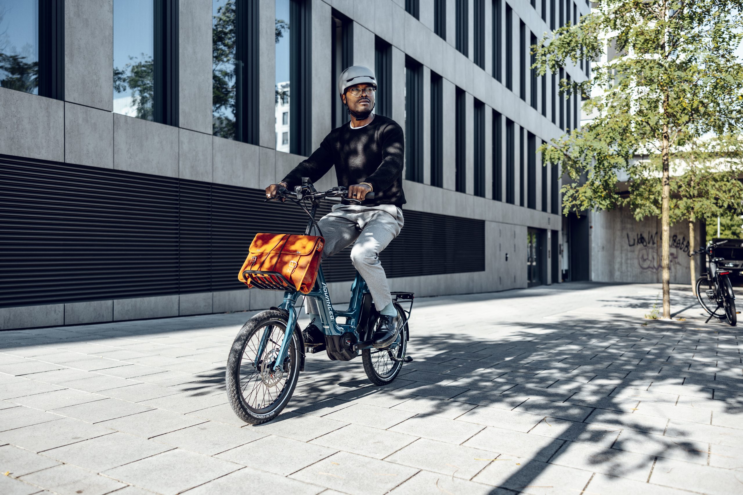 Person riding electric bike.