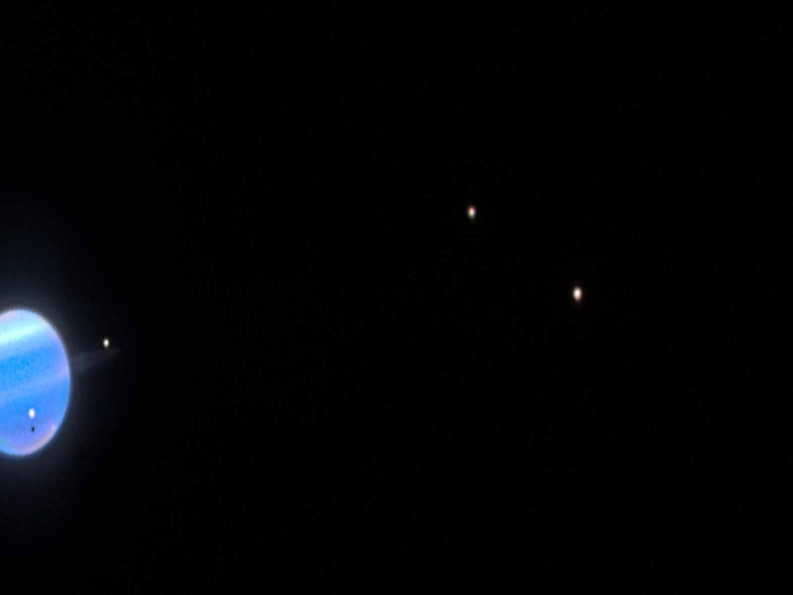 Uranus' Moons Stun NASA With An Unexpected Dark Discovery By Hubble