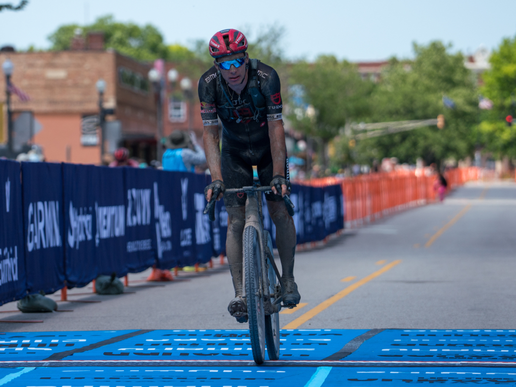 Simon Pellaud crosses the line in second in the 2025 Unbound Gravel 200