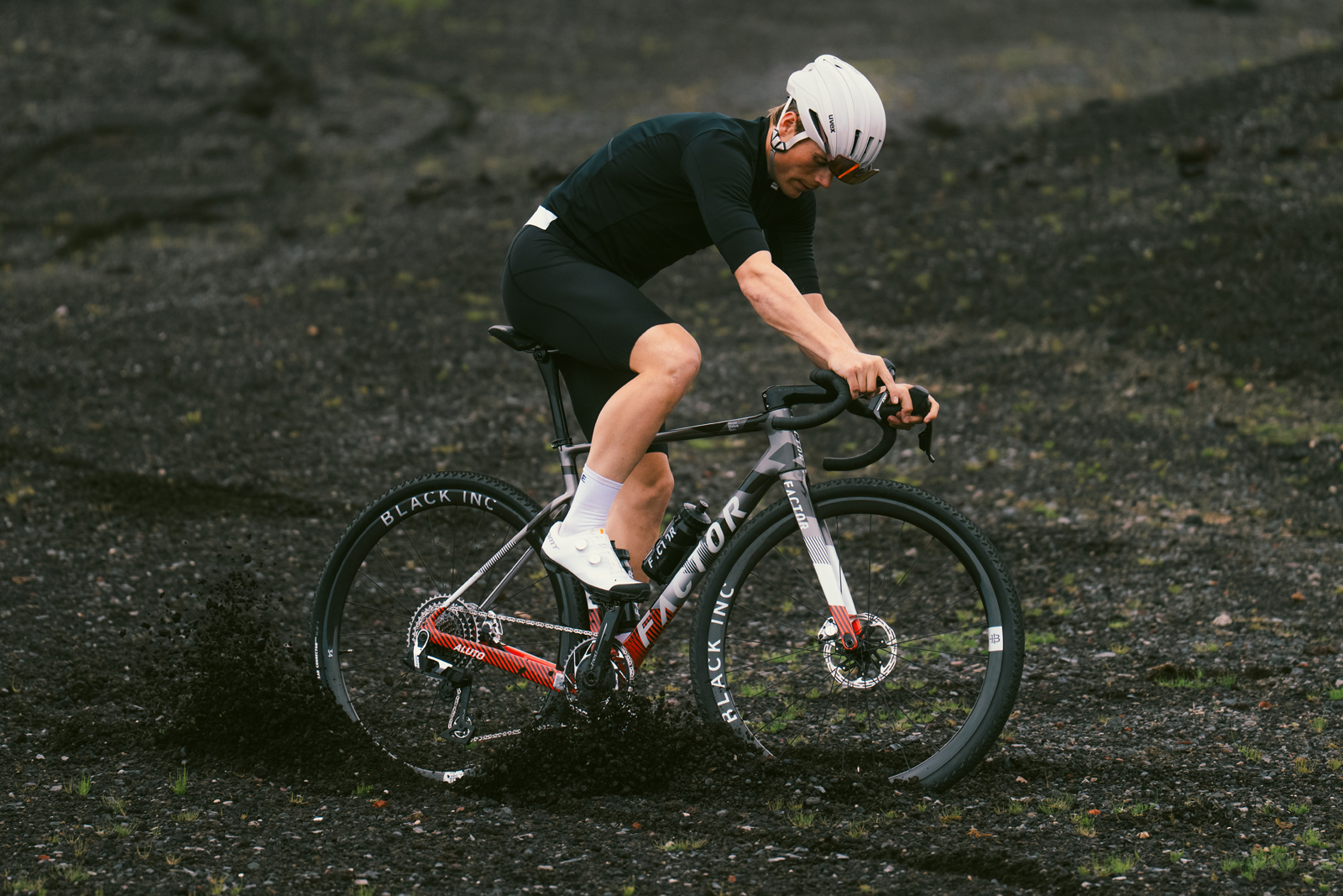 Man riding Factor Aluto gravel bike.