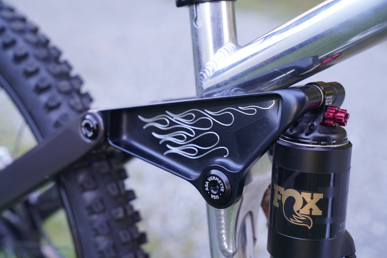 Asa Vermette's Frameworks DH at Lenzerheide DH 2025 with black linkage