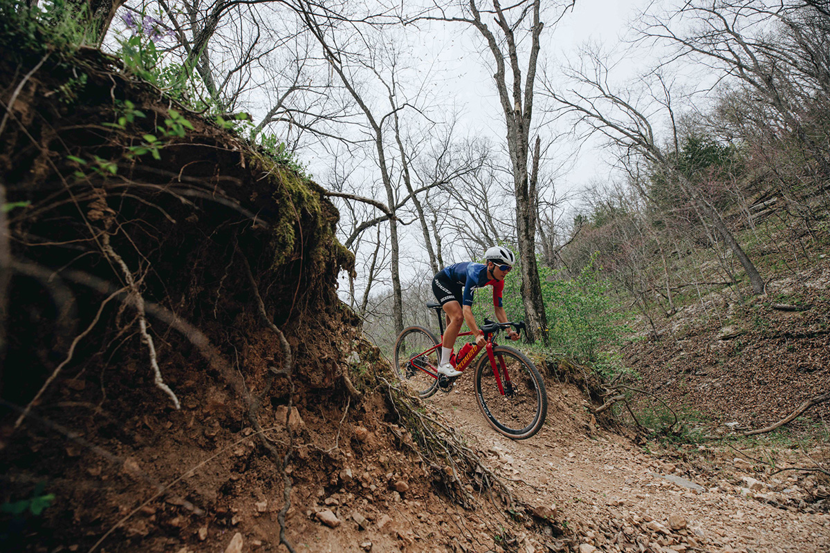 Sofia Gomez Villafane on a Specialized Diverge 4 Pro LTD dropping into a gravel trail