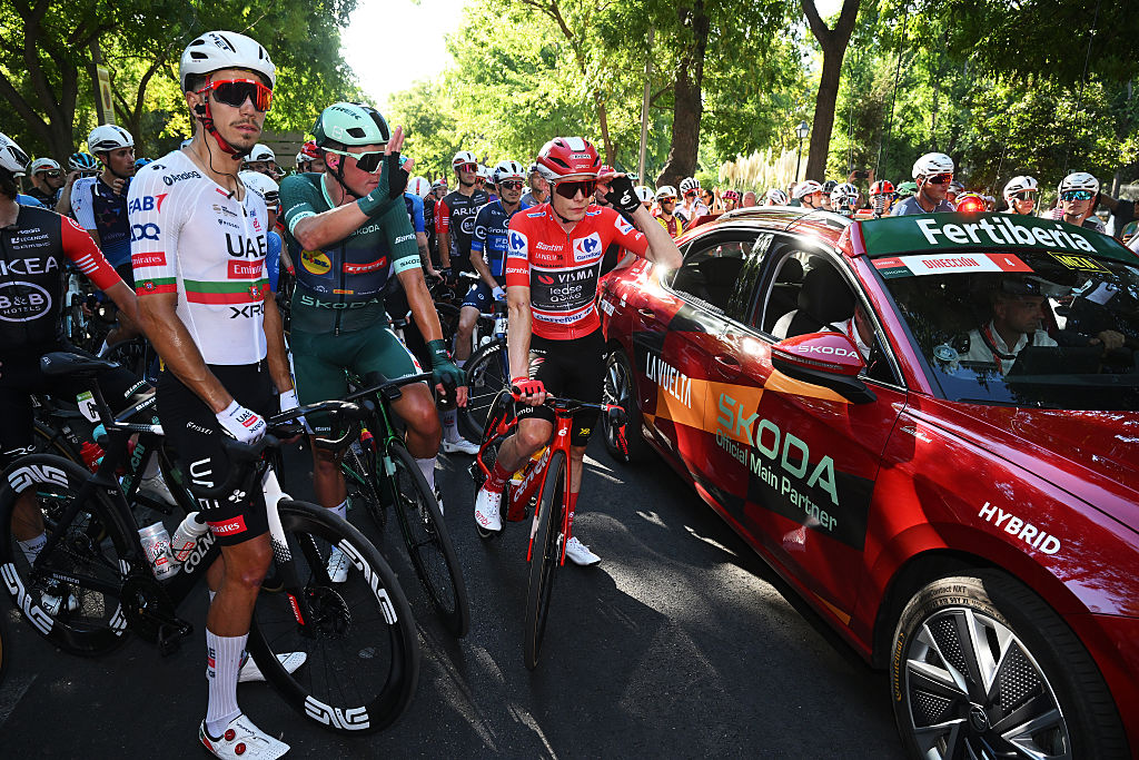 MADRID, SPAIN - SEPTEMBER 14: (L-R) Ivo Oliveira of Portugal and UAE Team Emirates - XRG, Mads Pedersen of Denmark and Team Lidl - Trek - Green Points Jersey and Jonas Vingegaard of Denmark and Team Visma | Lease a Bike - Red Leader Jersey and the peloton is at a standstill due to the pro-Palestinian protests in the city of Madrid during the La Vuelta - 80th Tour of Spain 2025, Stage 21 a 108km stage from Alalpardo to Madrid / #UCIWT / on September 14, 2025 in Madrid, Spain. (Photo by Dario Belingheri/Getty Images)