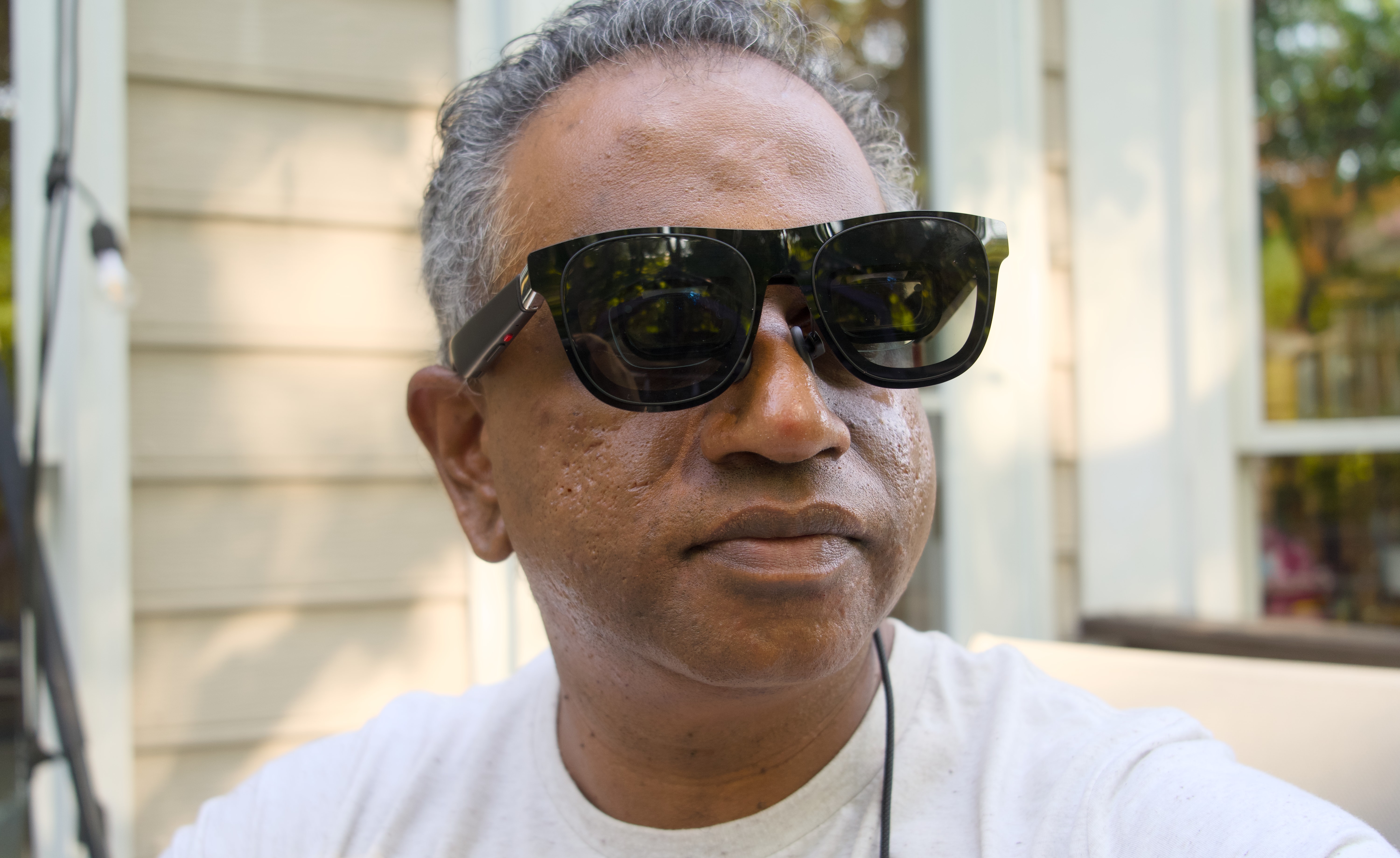 The Xreal One Pro smart glasses look very similar to oversized sunglasses.