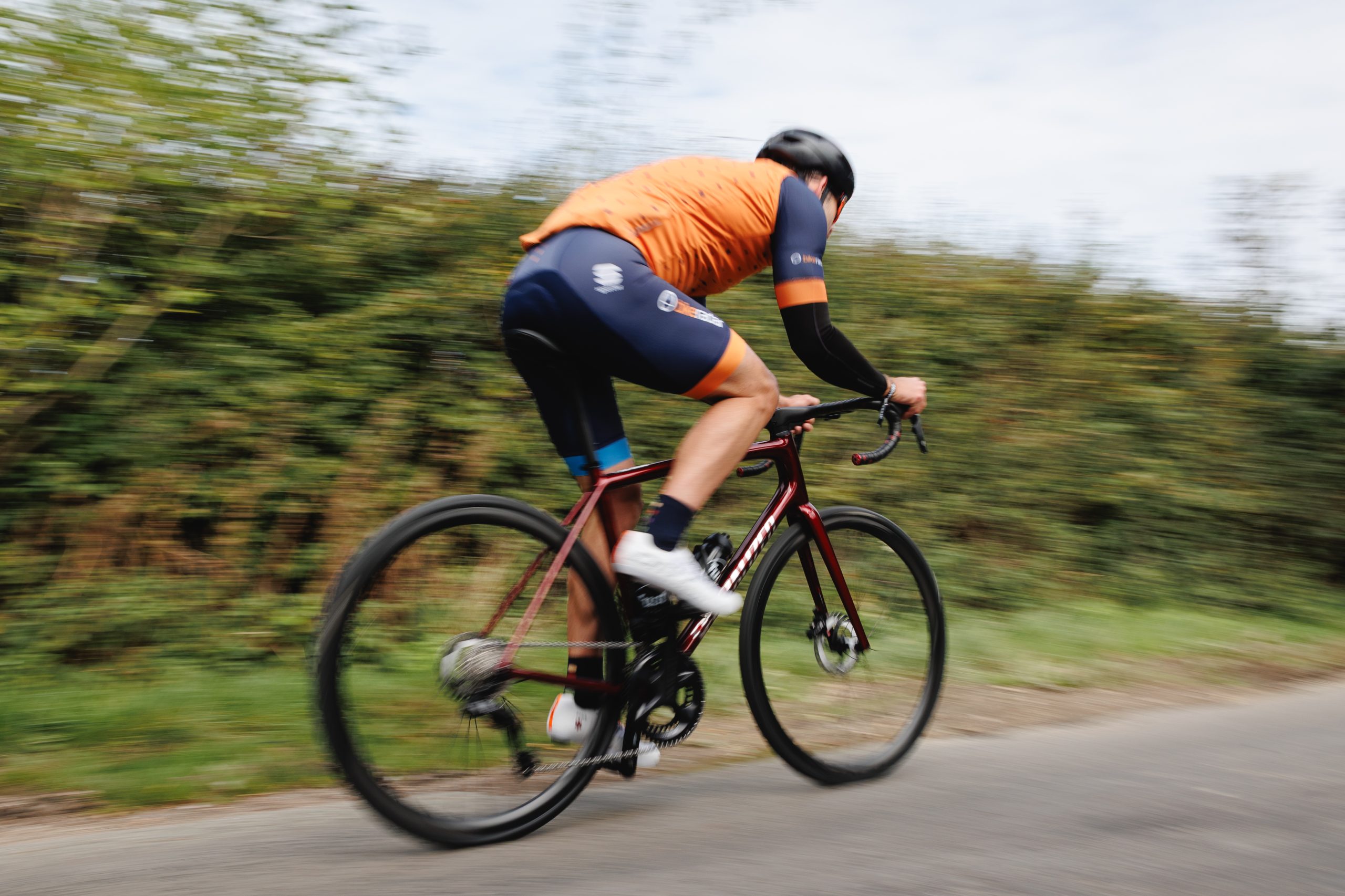 Male cyclist riding the Specialized Aethos 2