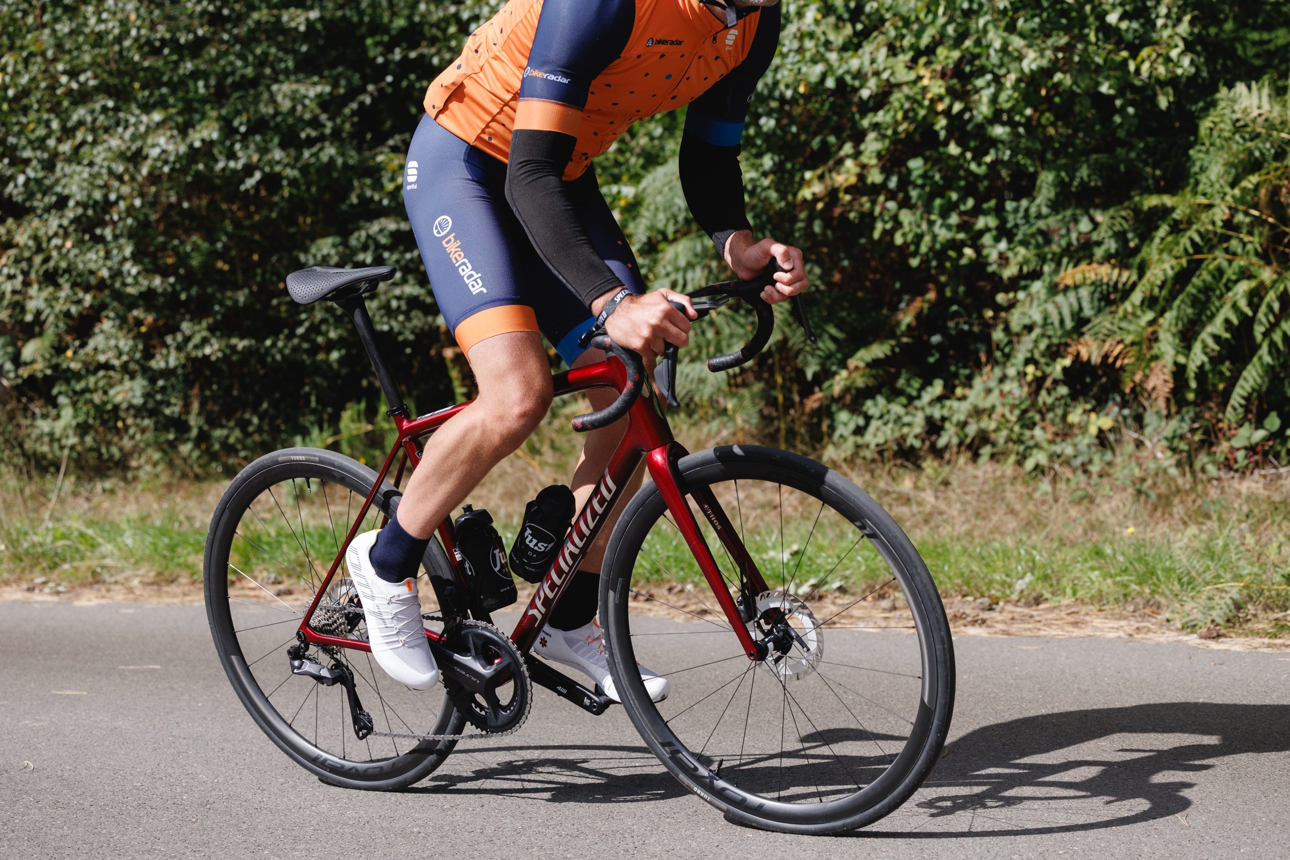 Male cyclist riding the Specialized Aethos 2