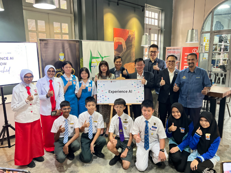 A group of students and educators at Penang Science Cluster's launch of Experience AI in Malaysia.