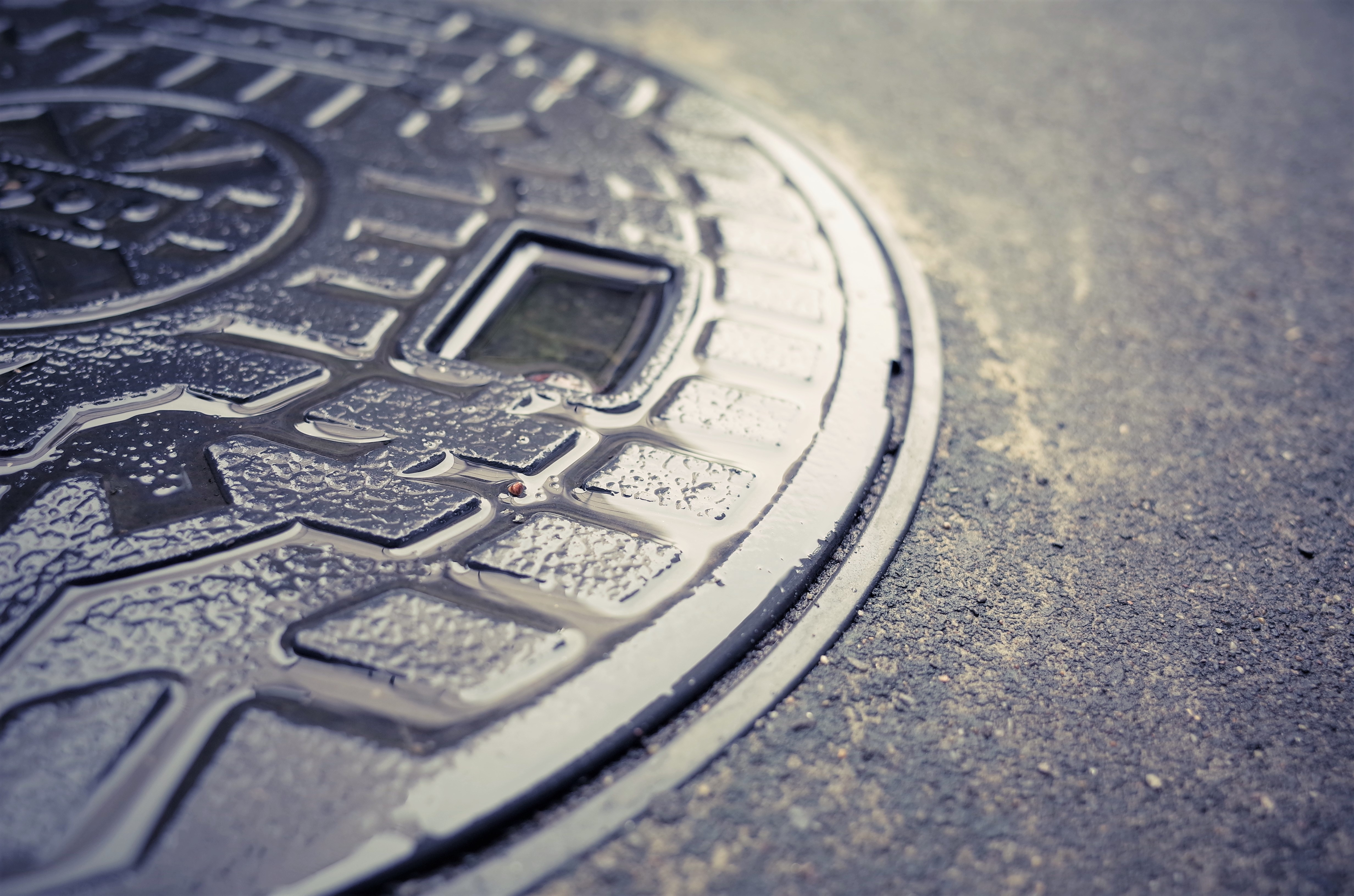 Manhole in rainy day. Manhole in rainy day.