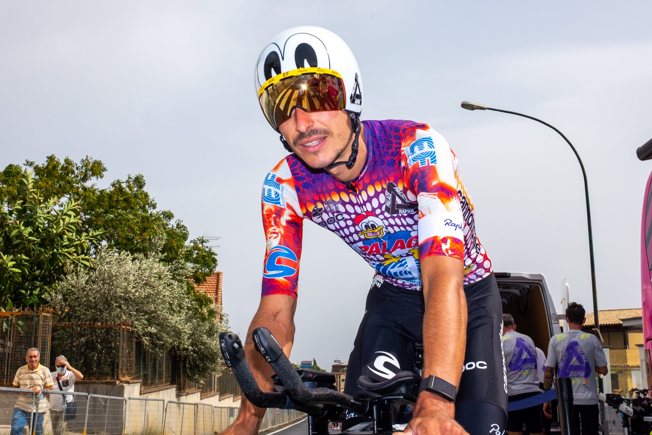 Lachlan Morton at 2020 Giro d'Italia in helmet with duck design.