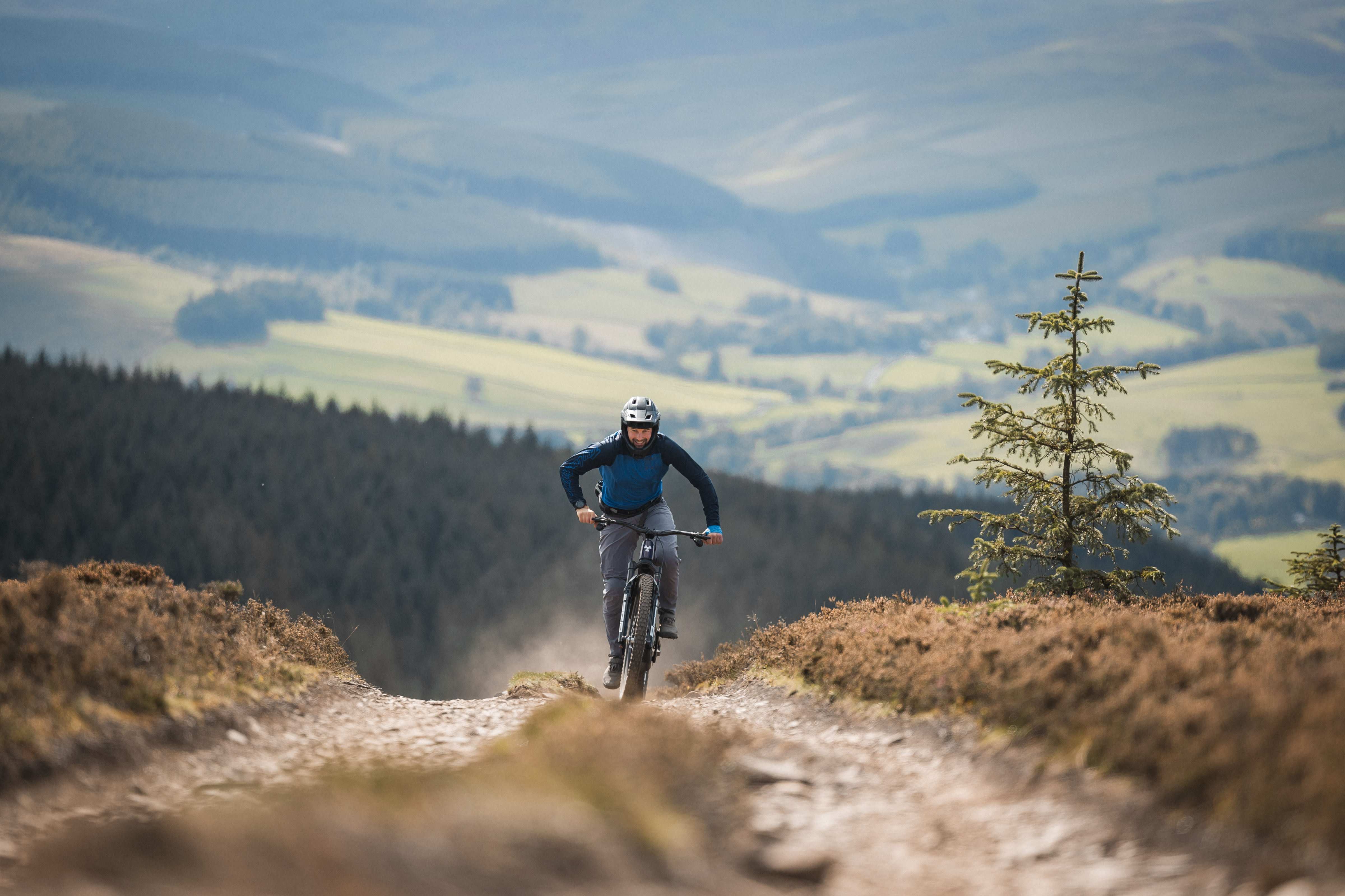 SRAM Eagle Powertrain electric mountain bike motor fitted to a Nukeproof Megawatt enduro eMTB ridden by Alex Evans, BikeRadar's senior technical editor on a mountain bike trail at the Golfie in the Scottish Borders, UK.