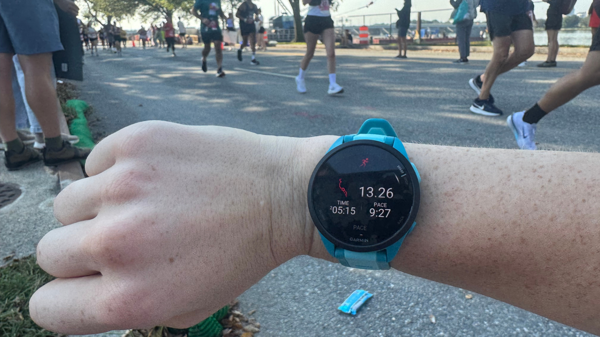 Racing a half-marathon with the Garmin Forerunner 165.