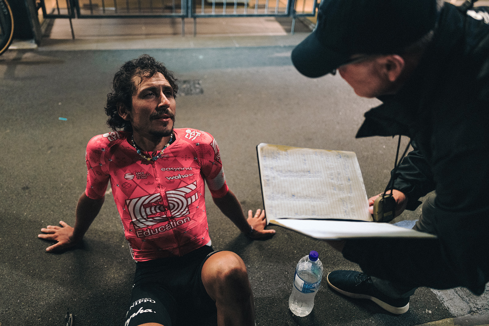 Lachlan Morton resting on ground after Auckland to Wellington record attempt.