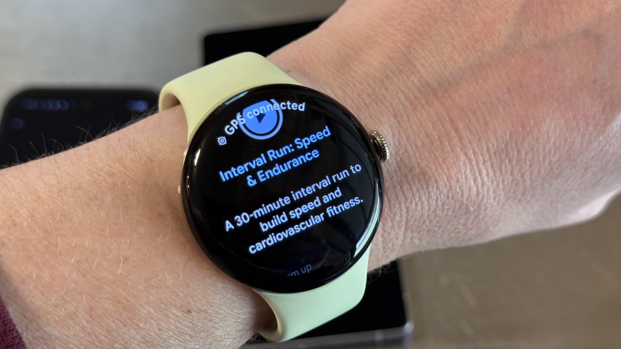 Pixel Watch 4 showing a workout from the Fitbit app