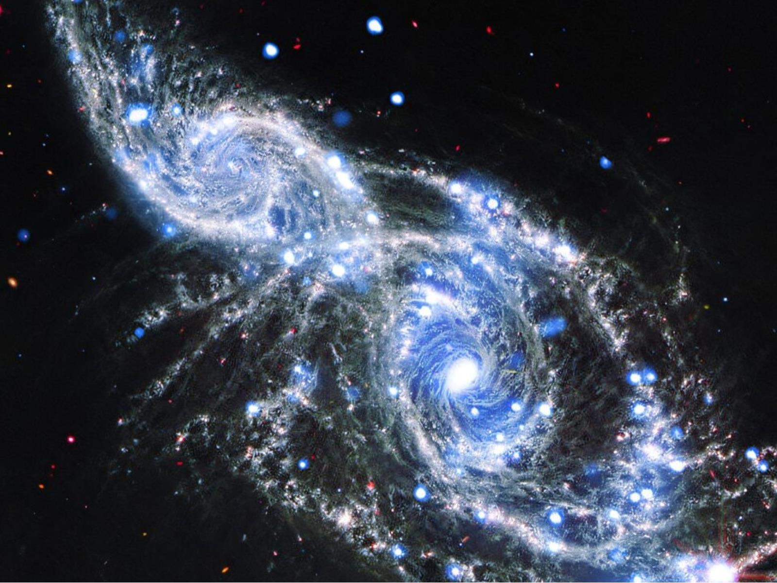 NASA's Webb Captures Spiral Galaxies Colliding In Unprecedented Detail