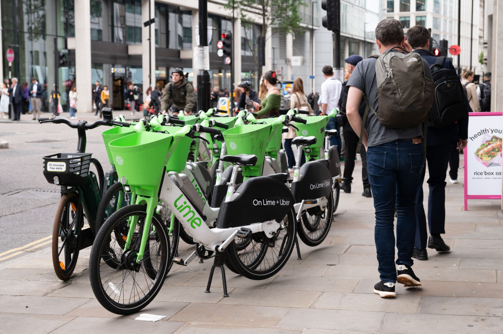 Lime rental ebikes parked in Finsbury Square, Islington, London.