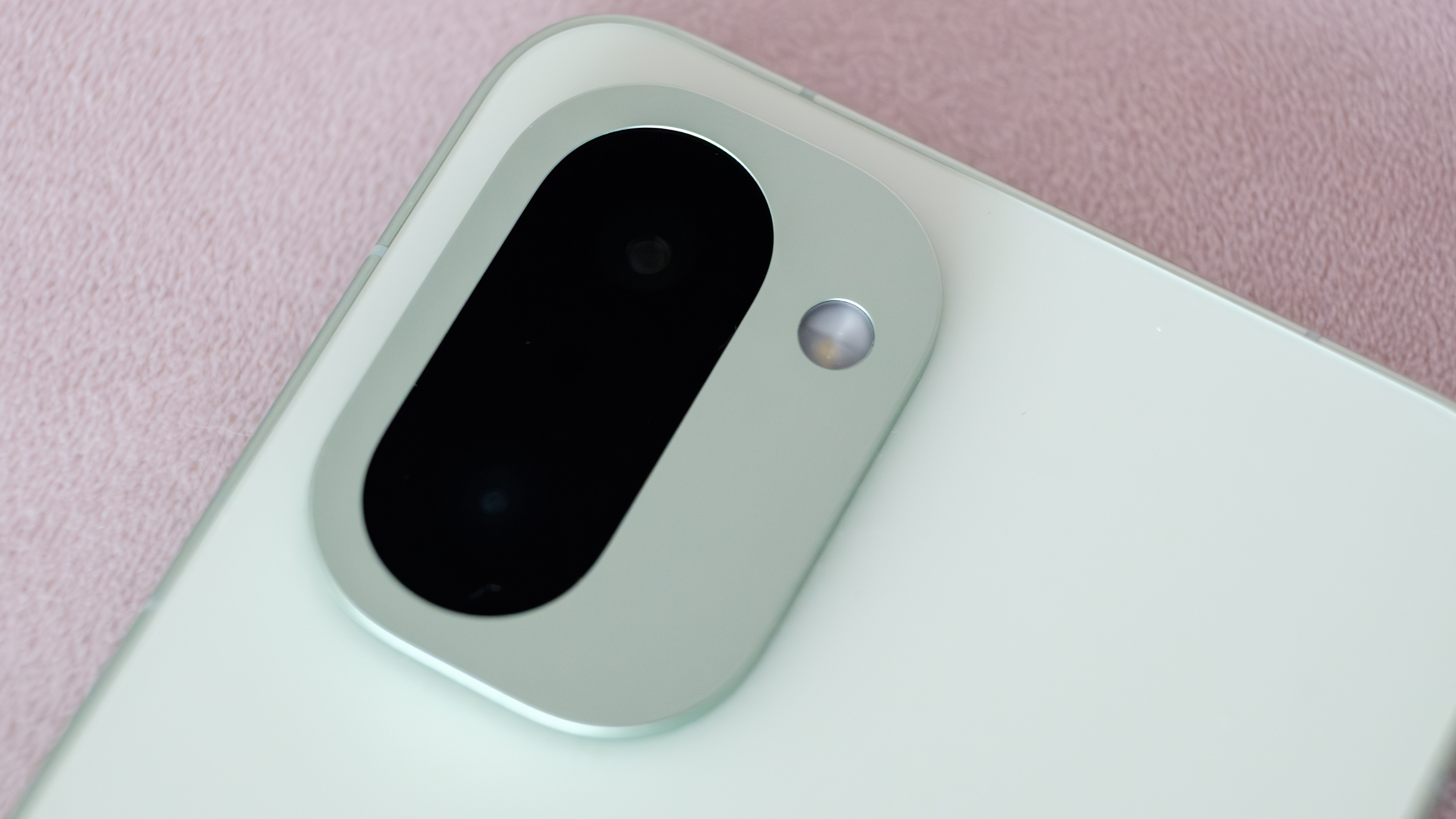 A closeup of the OnePlus 15R's camera module. 