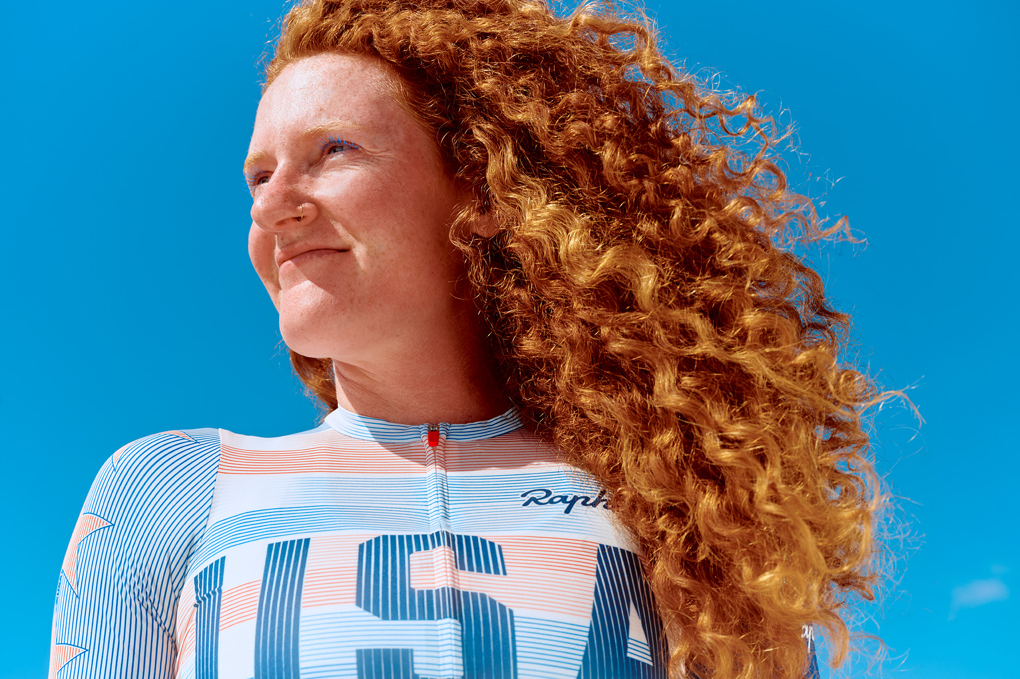 Clara Brown, track and road para cyclist wearing Rapha USA Kit