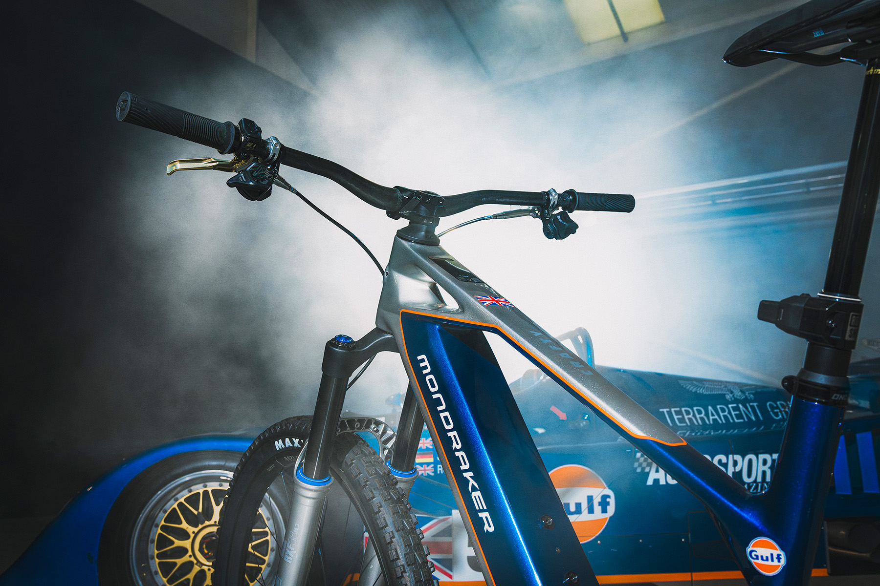 Mondraker Crafty Unlimited Gulf Edition collab with car close up