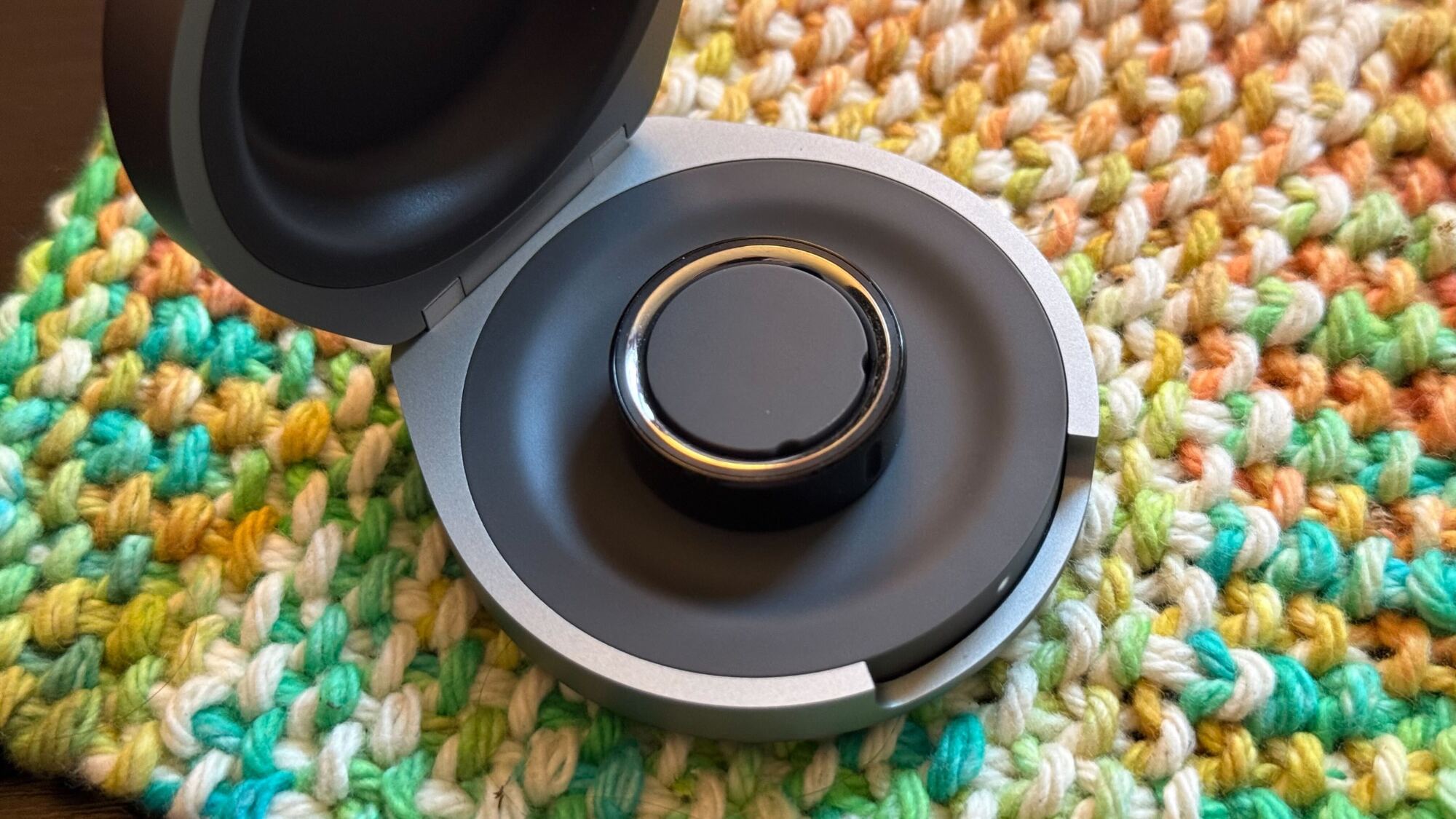 Oura's charging case, open