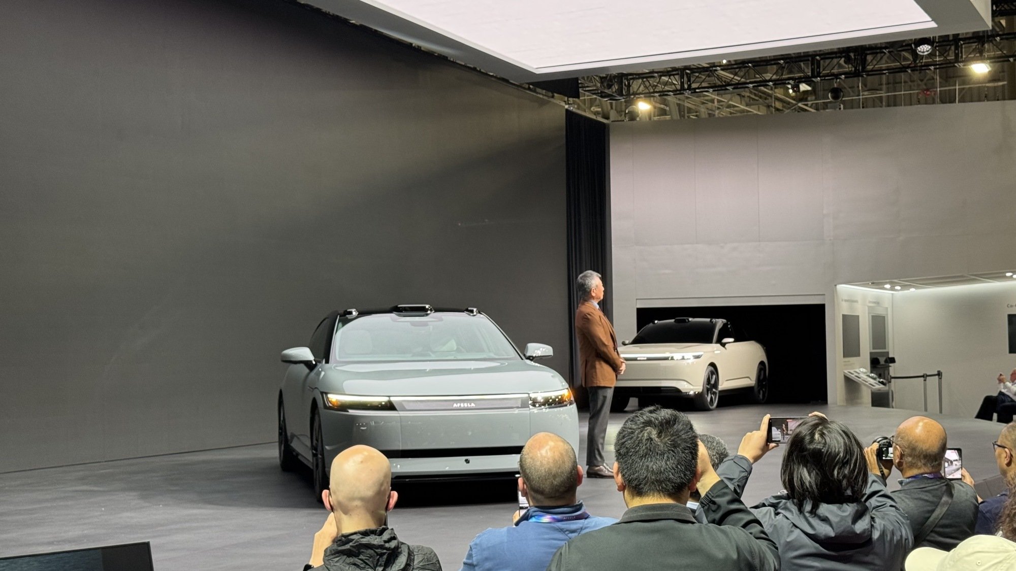 The Afeela Prototype 2026 being driven on stage