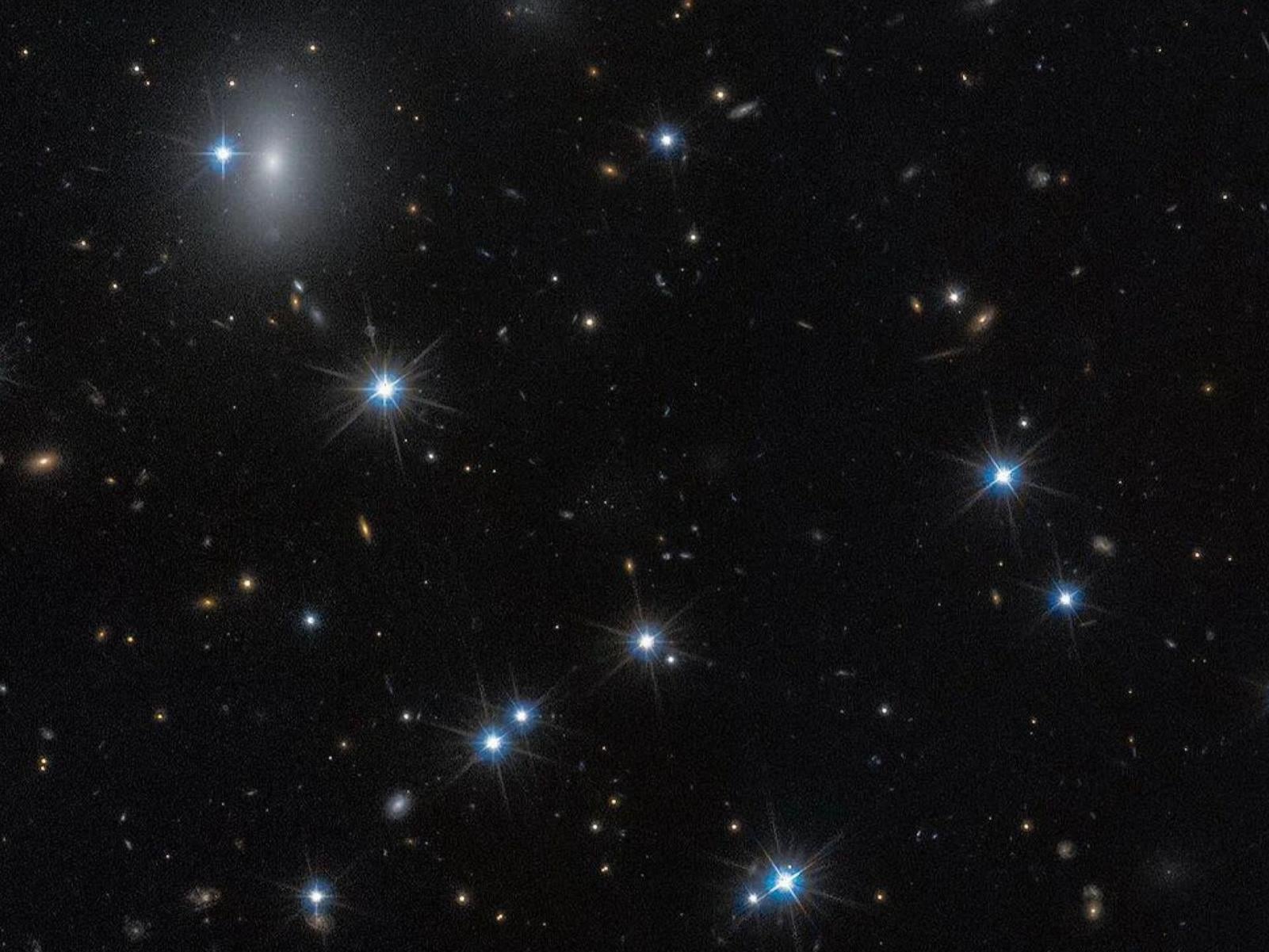 Hubble Captures Rare Image Of A Galaxy Made Almost Entirely Of Invisible Dark Matter
