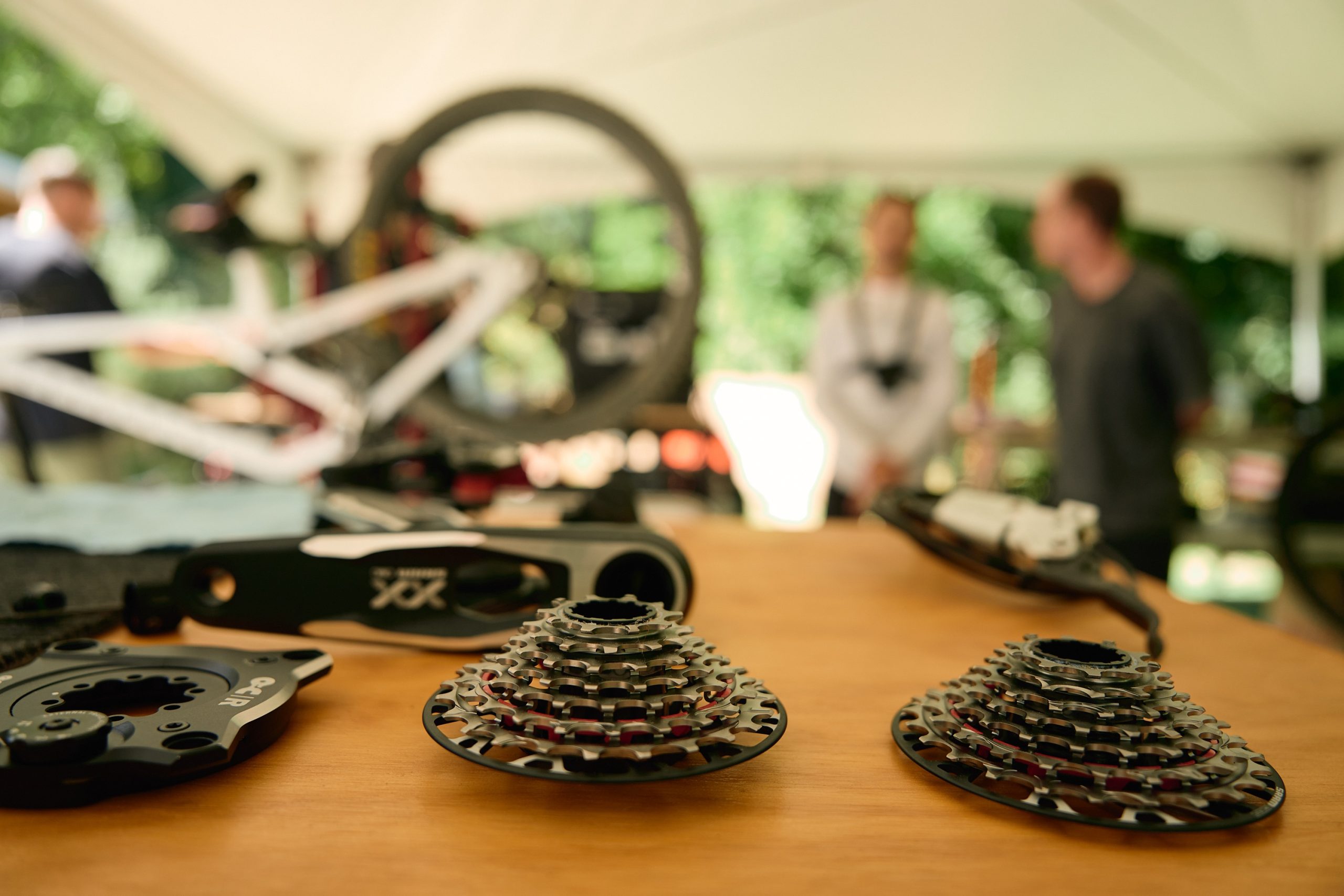 SRAM XX DH Transmission cassettes laid out on a bench.