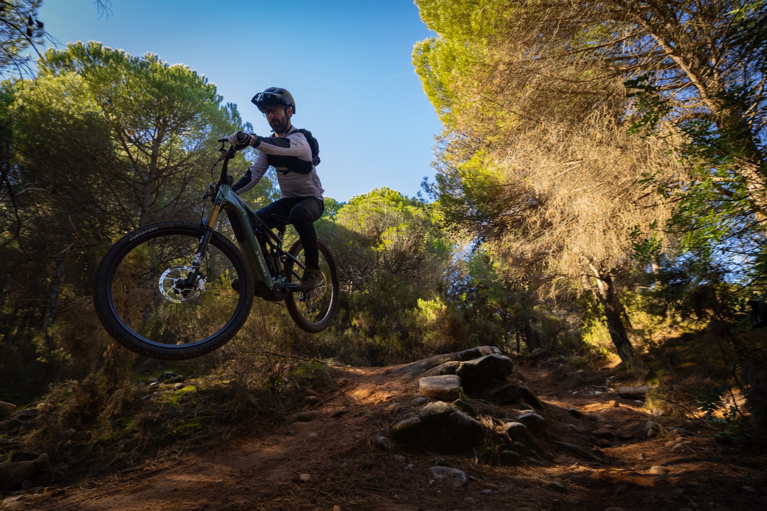 Specialized Levo R S-Works eMTB jump shot, with Rob Weaver riding.