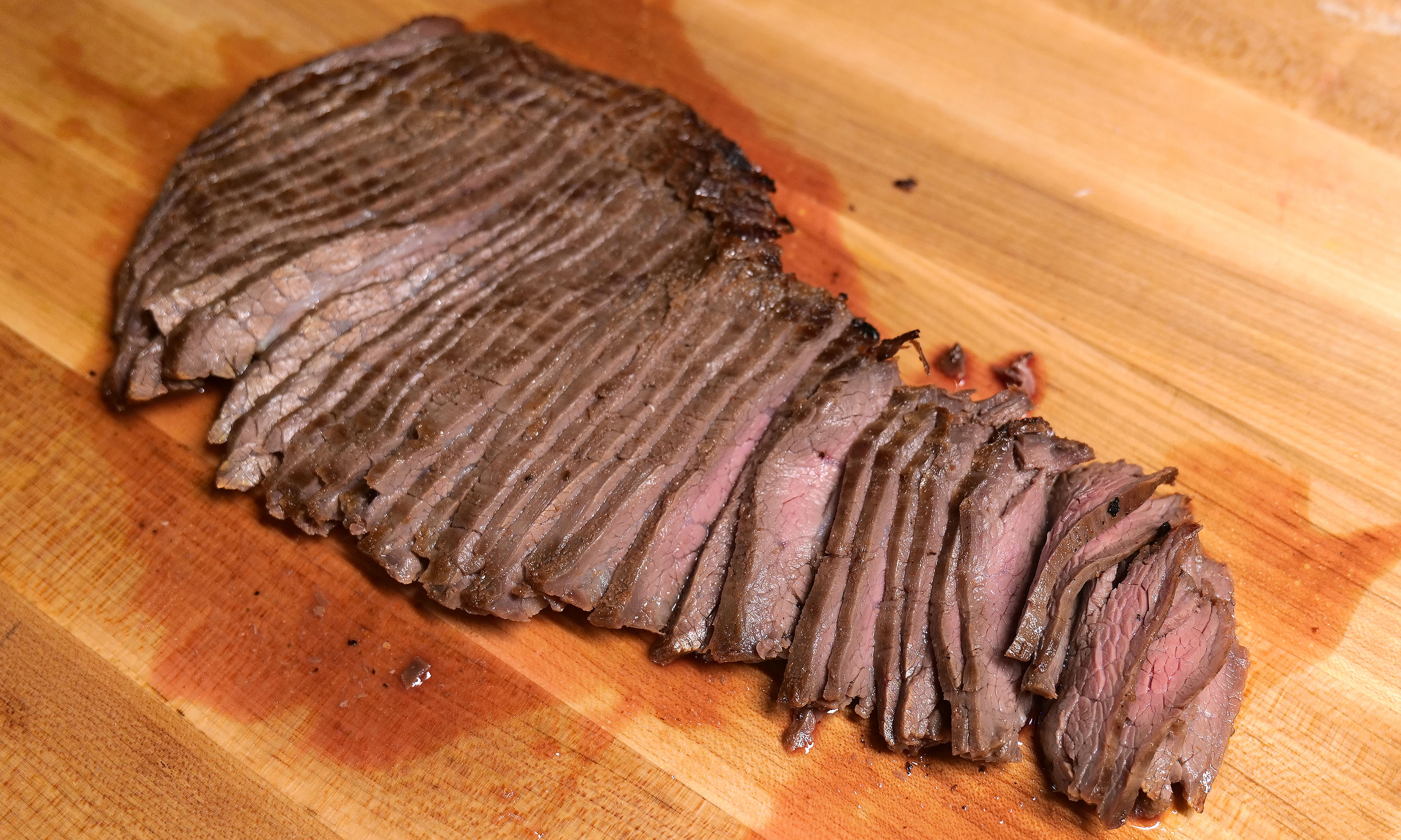 The C-200 truly excels at cutting denser foods like flank steak. Sadly mine ended up closer to medium than medium rare, but that's not the knife's fault. 